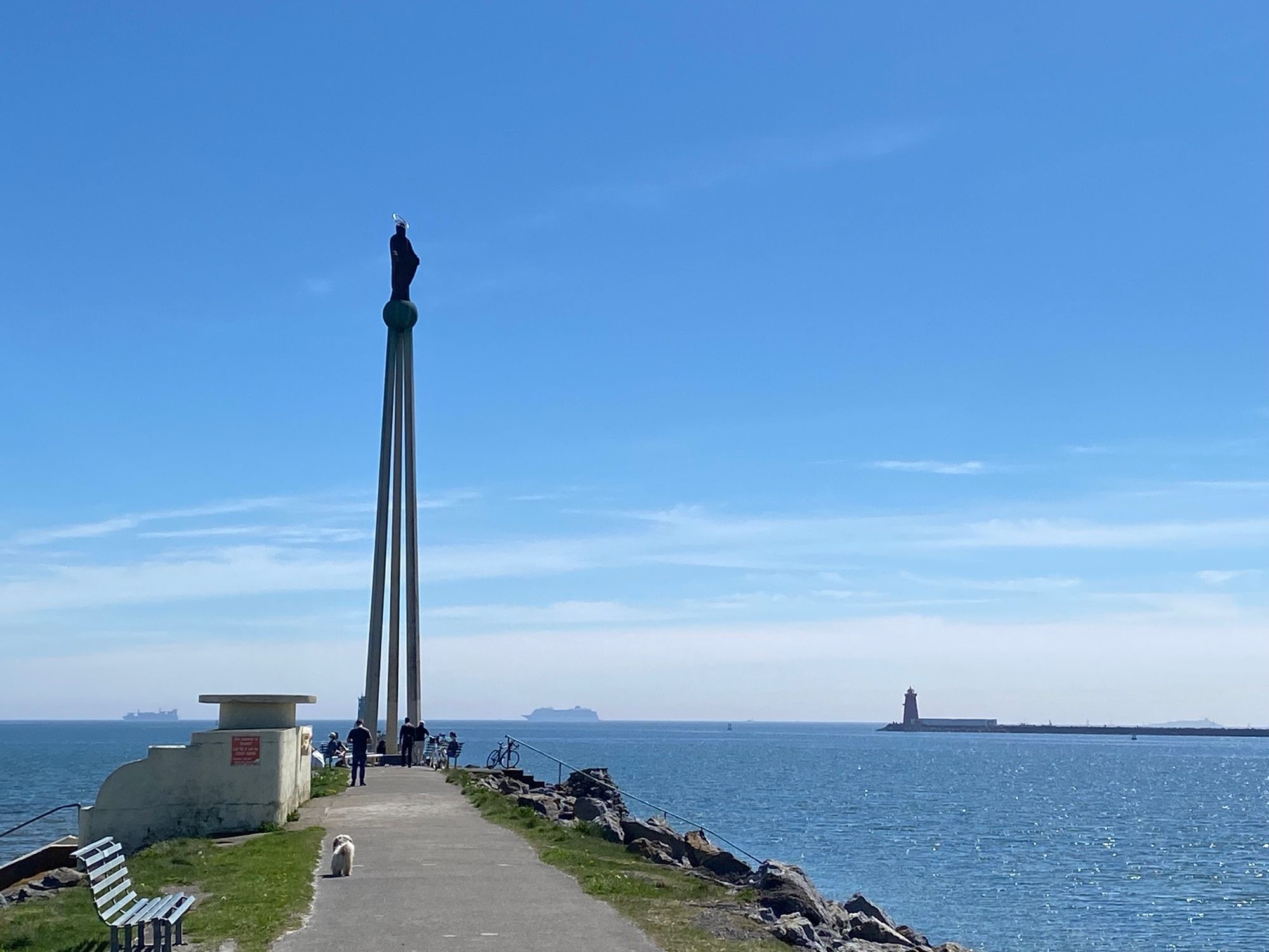 Mary statute on Bull Island with lighthouse and ferries in background