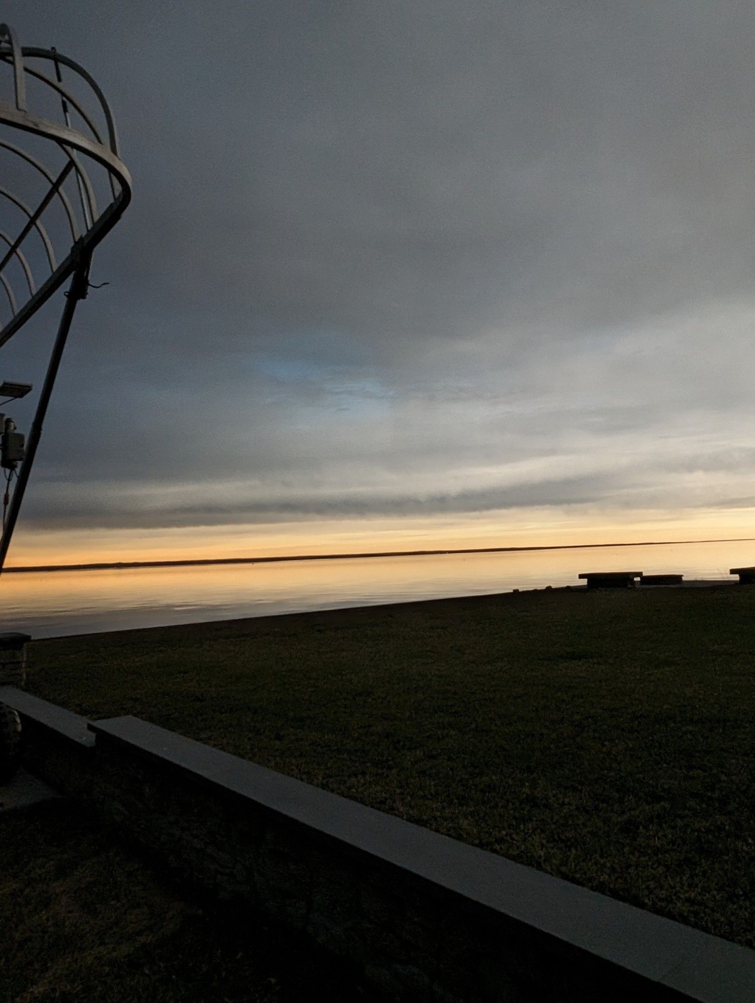 The sky is dark with a light orange over the horizon