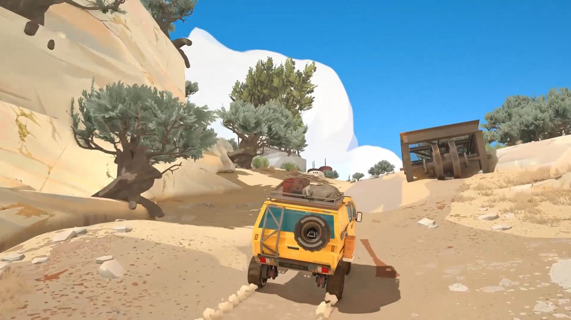 Screenshot from caravan SandWitch. The van running up a hill.