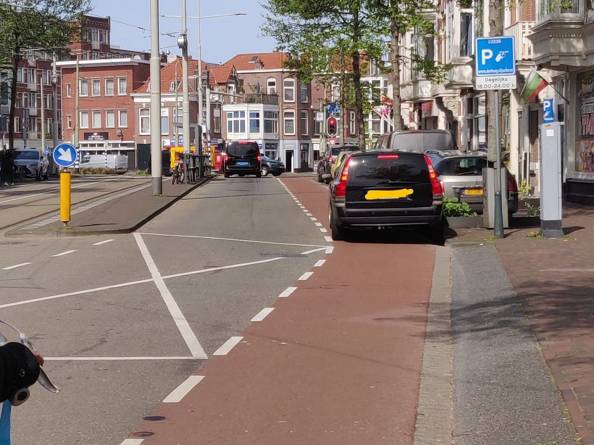 Car parked on the cycling lane