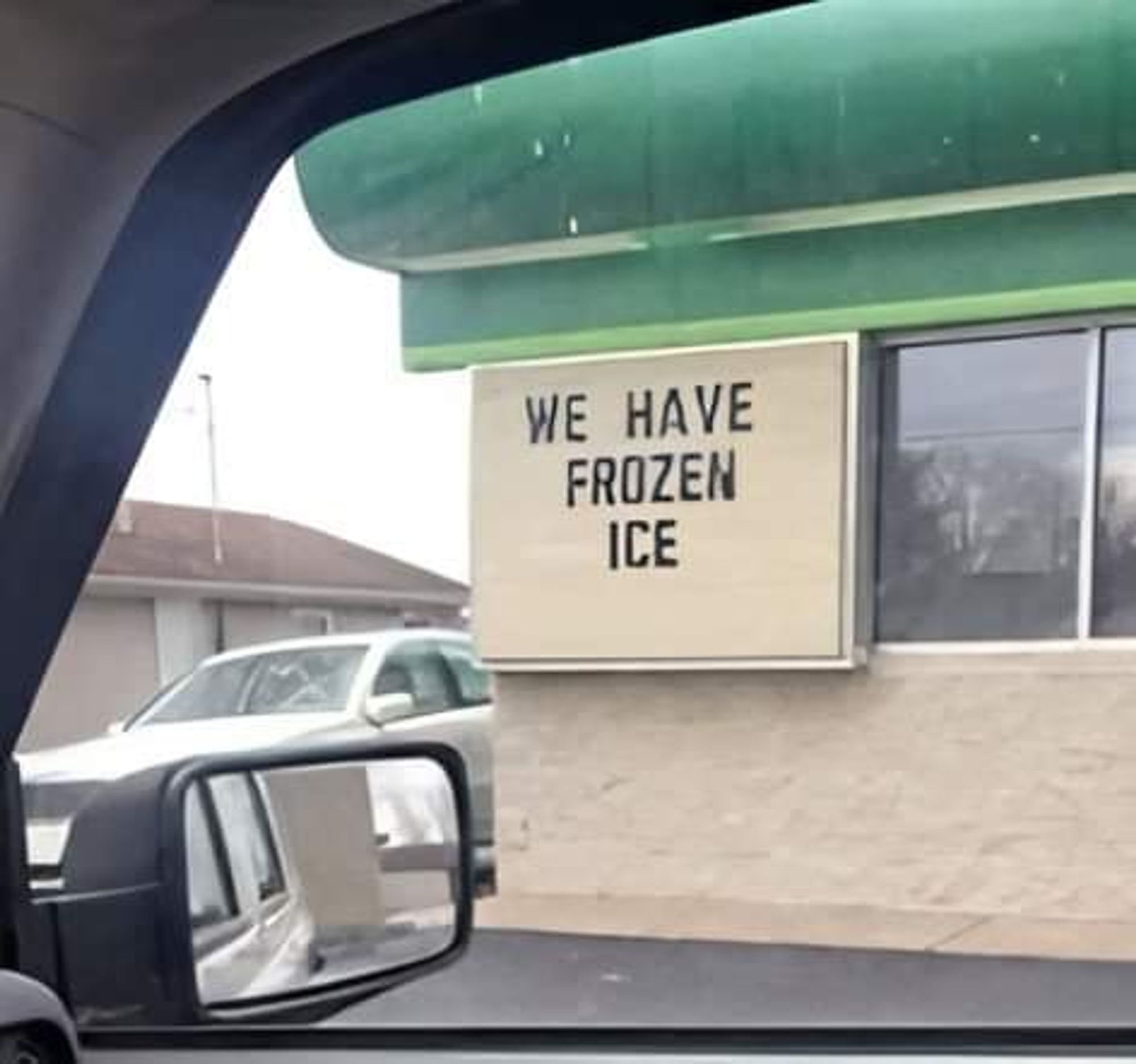 Sign on shop: We have frozen ice.