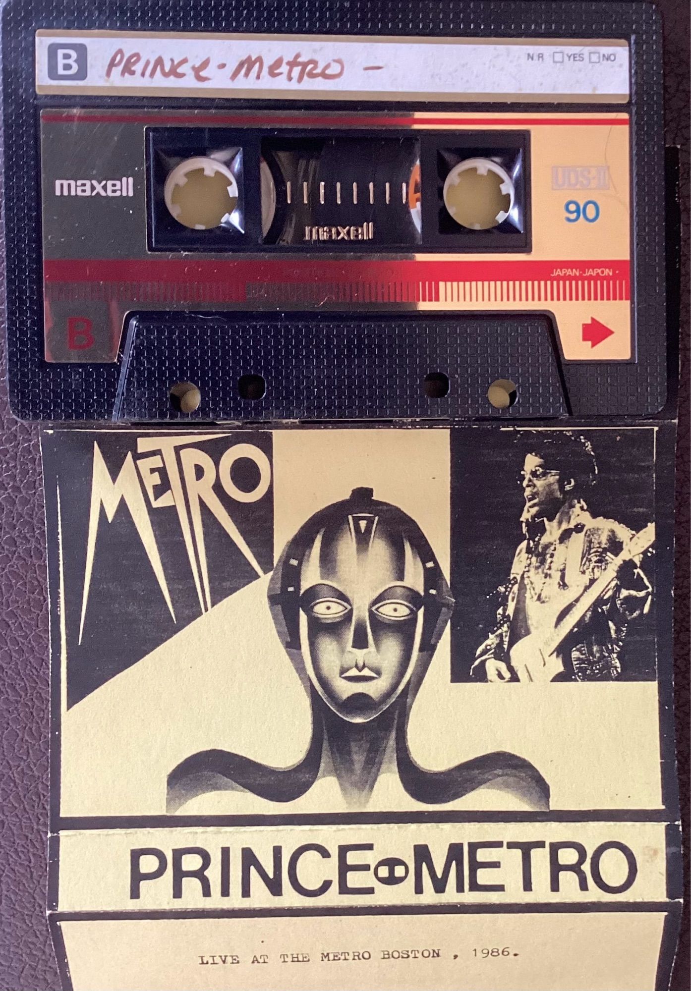 Bootleg tape of Prince playing Club Metro in 1986.
New Position 
Rasberry Beret
Curiosity>
On the One>
Nobody Funk w/ Us
Soft & Wet
Head
Pop Life
Girls & Boys
Purple Rain
Whole Lotta Shakin’ Goin’ On
A Love Bizarre 
Kiss