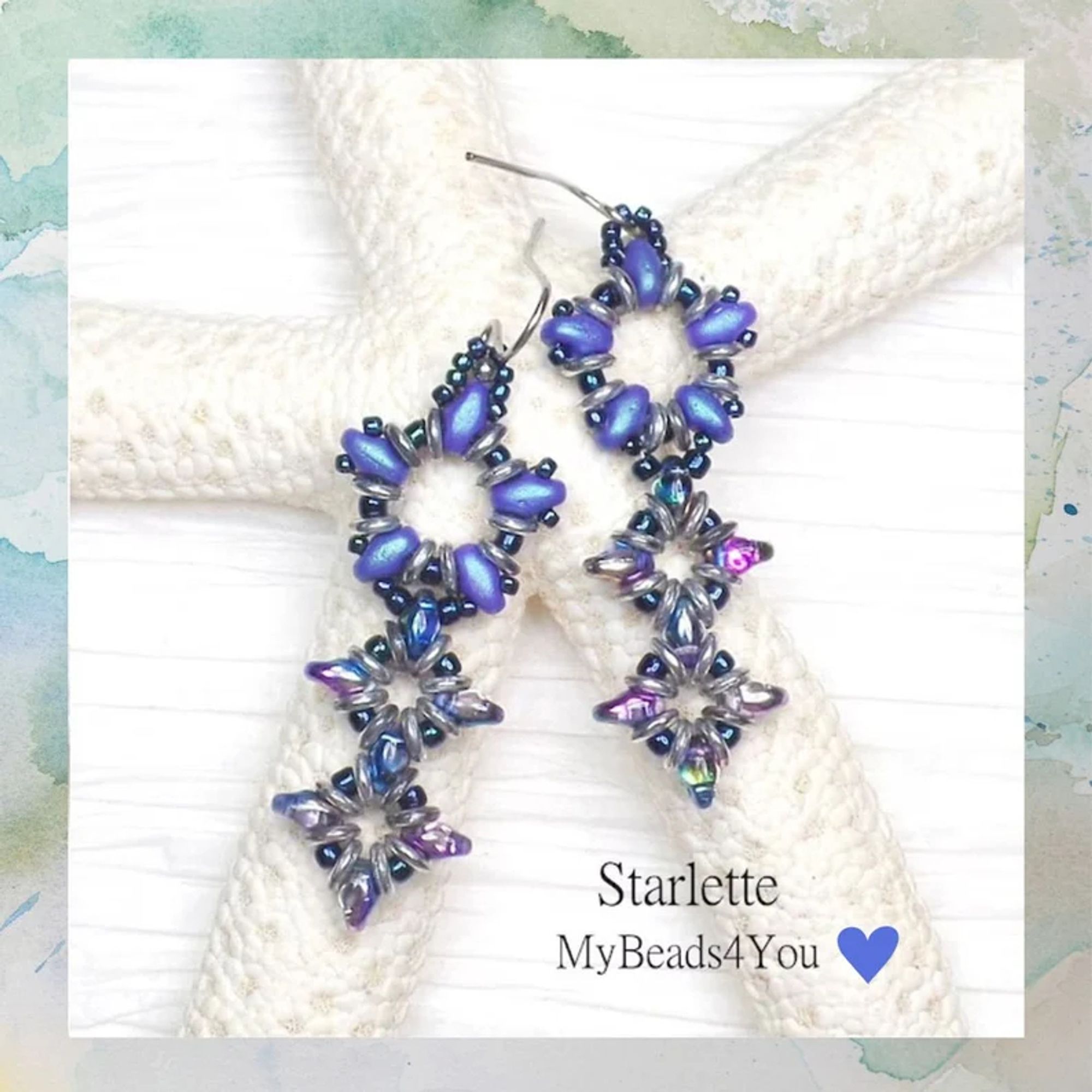 handmade seed bead earrings with blue and silver beads. 
measurements 2 inches long X 3/4 at the widest.
thank you for shopping.  My Beads 4 You Etsy Shop