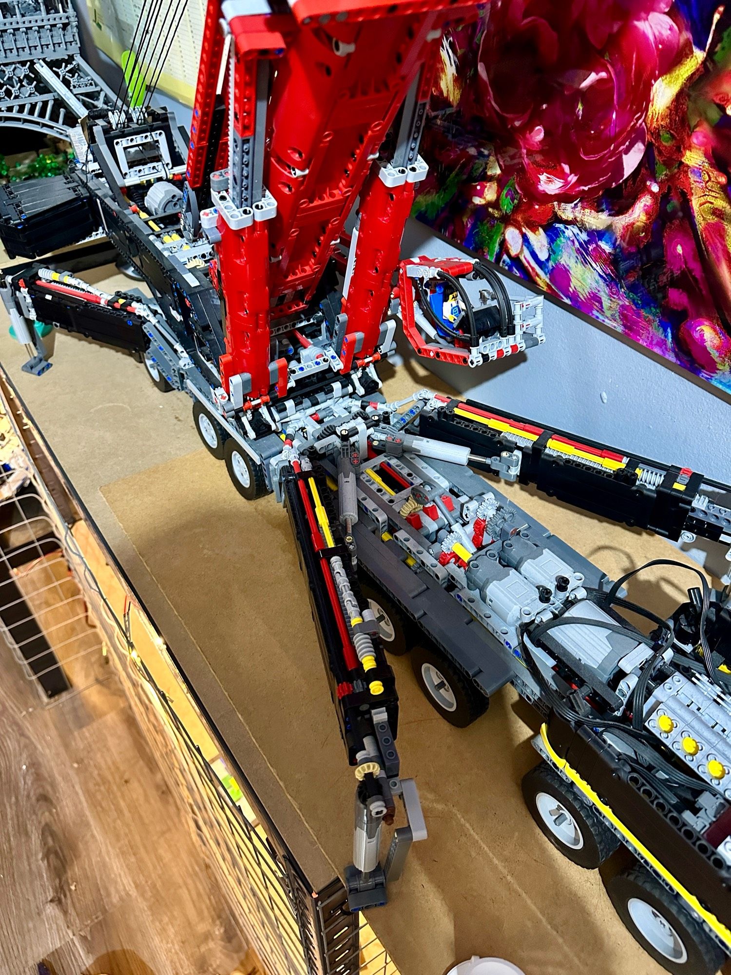 A massive Lego model of a massive mobile crane.