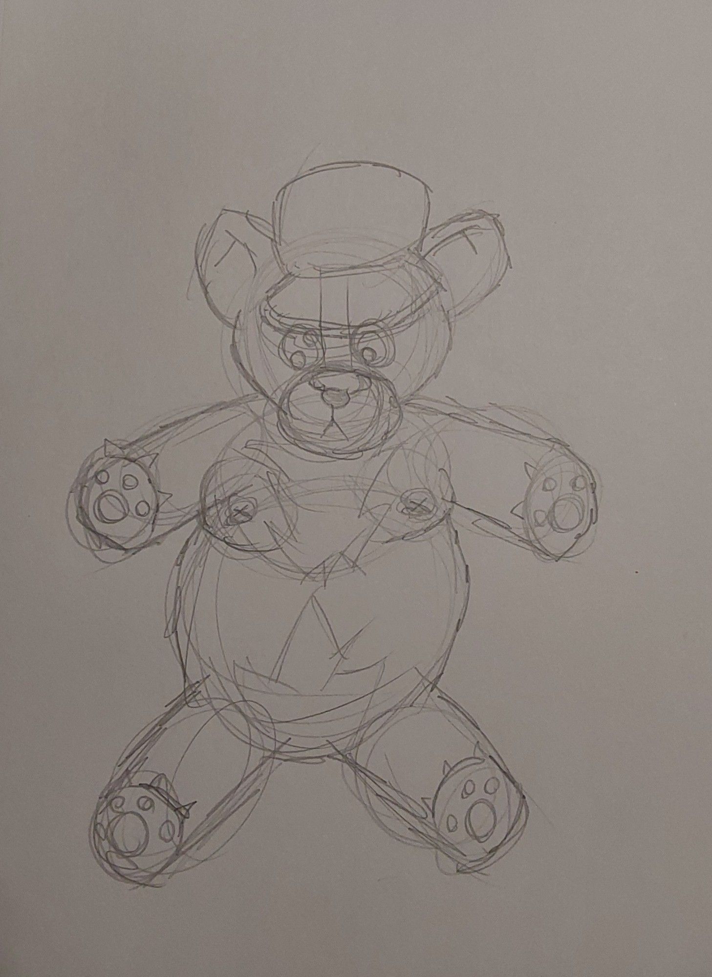 An overstuffed teddy bear with a cap