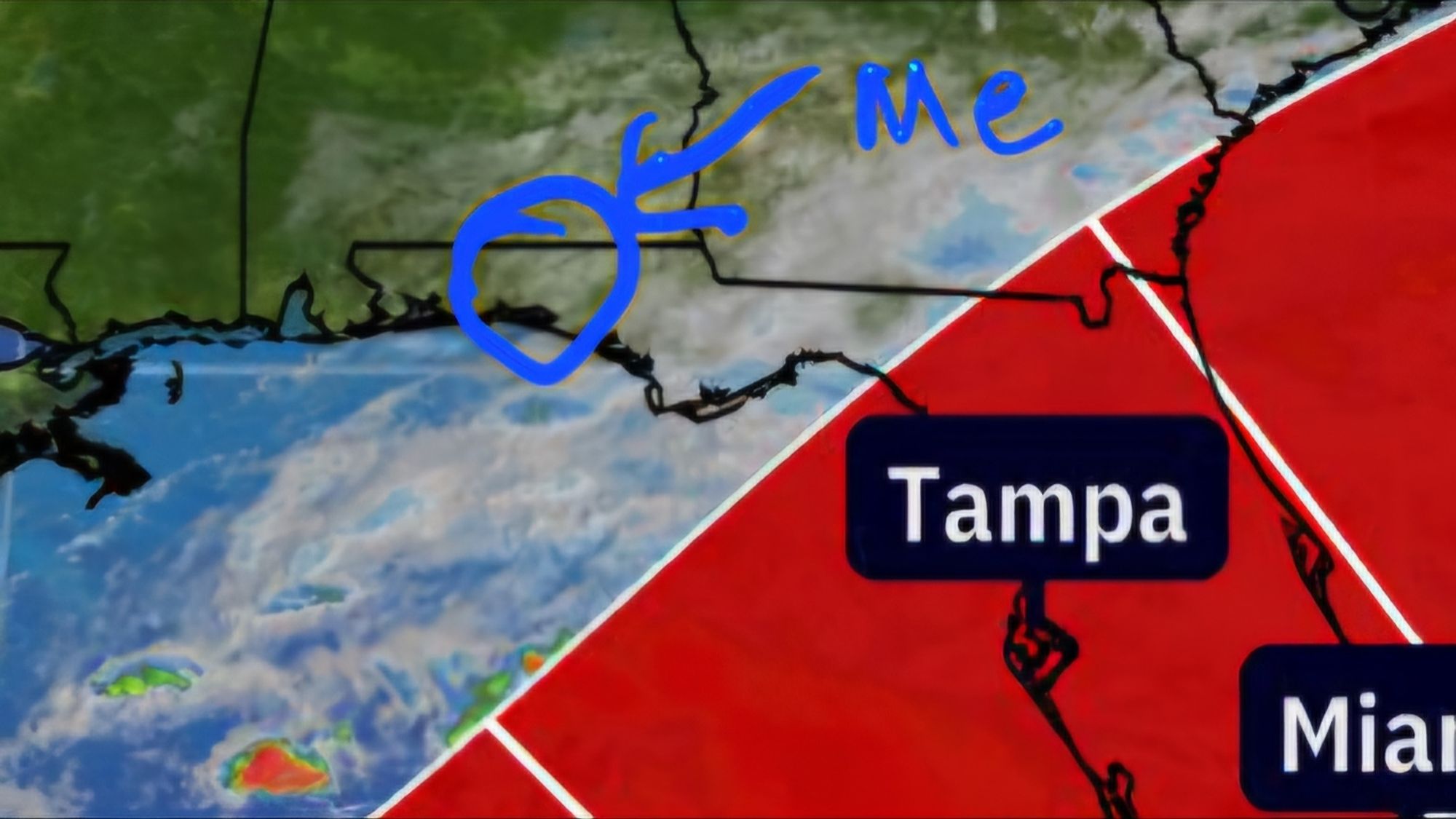 A zoomed in image of a map with the edge of a hurricane prediction zone on the right bottom side. There's a blue circle on the left top side that indicates my position.