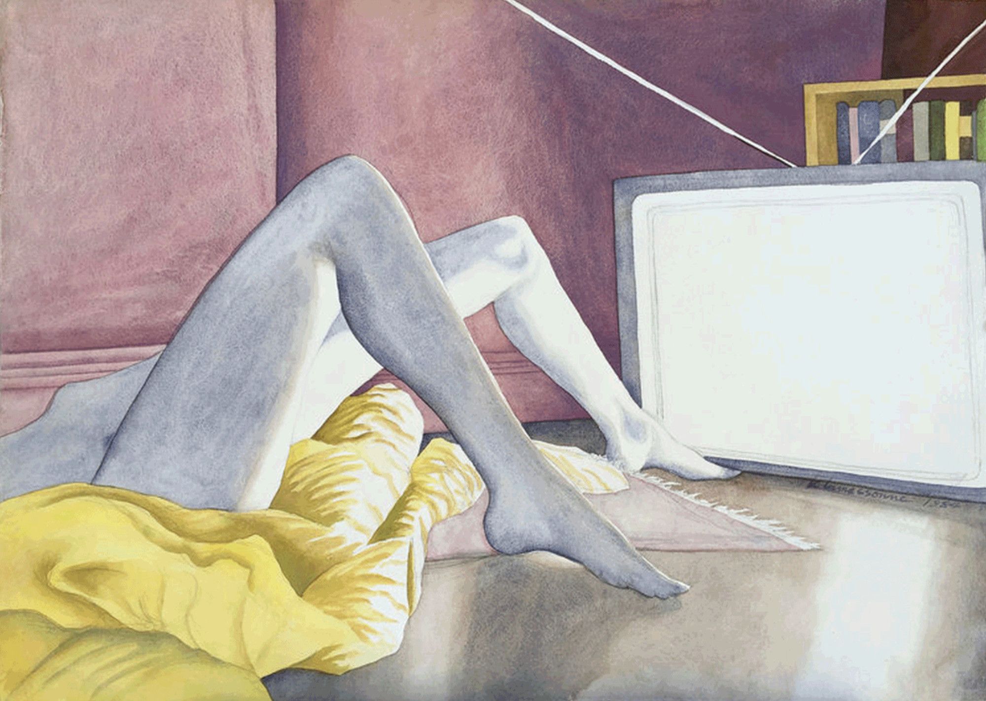 A pair of gray-white legs lying on the floor, knees raised, on a yellow puffy blanket, with a large tv on the floor shining a white screen over the room