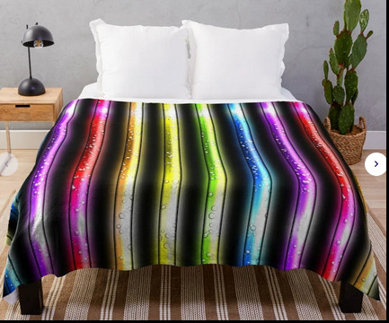 Black throw blanket with Glowing Rainbow Bubble Tubes- six colors of tubes full of bubbling liquid.