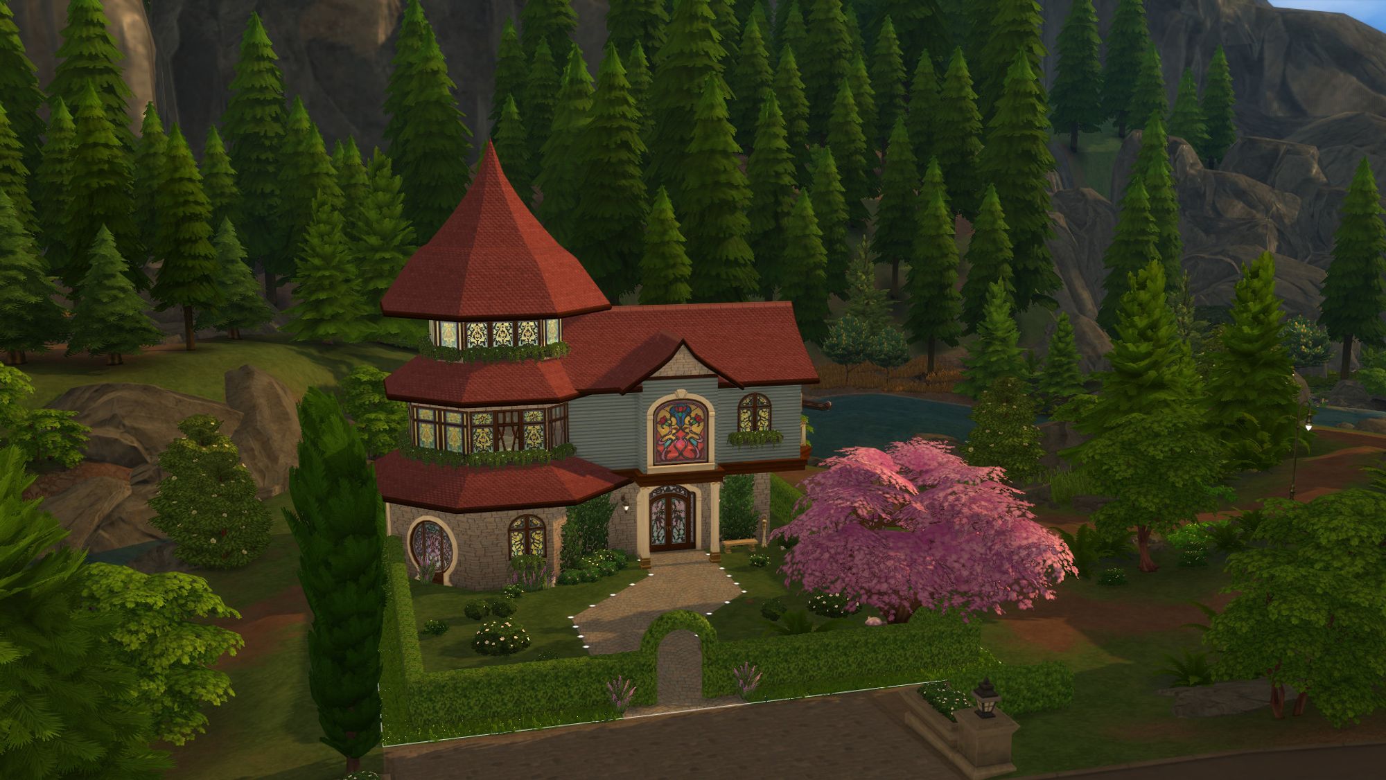 A custom house built in The Sims 4 by Rosie. Built with base game and Realm of Magic. It's a whimsical, magical house in the forests of Glimmerbrook. A blueish house with a reddish pointy roof.