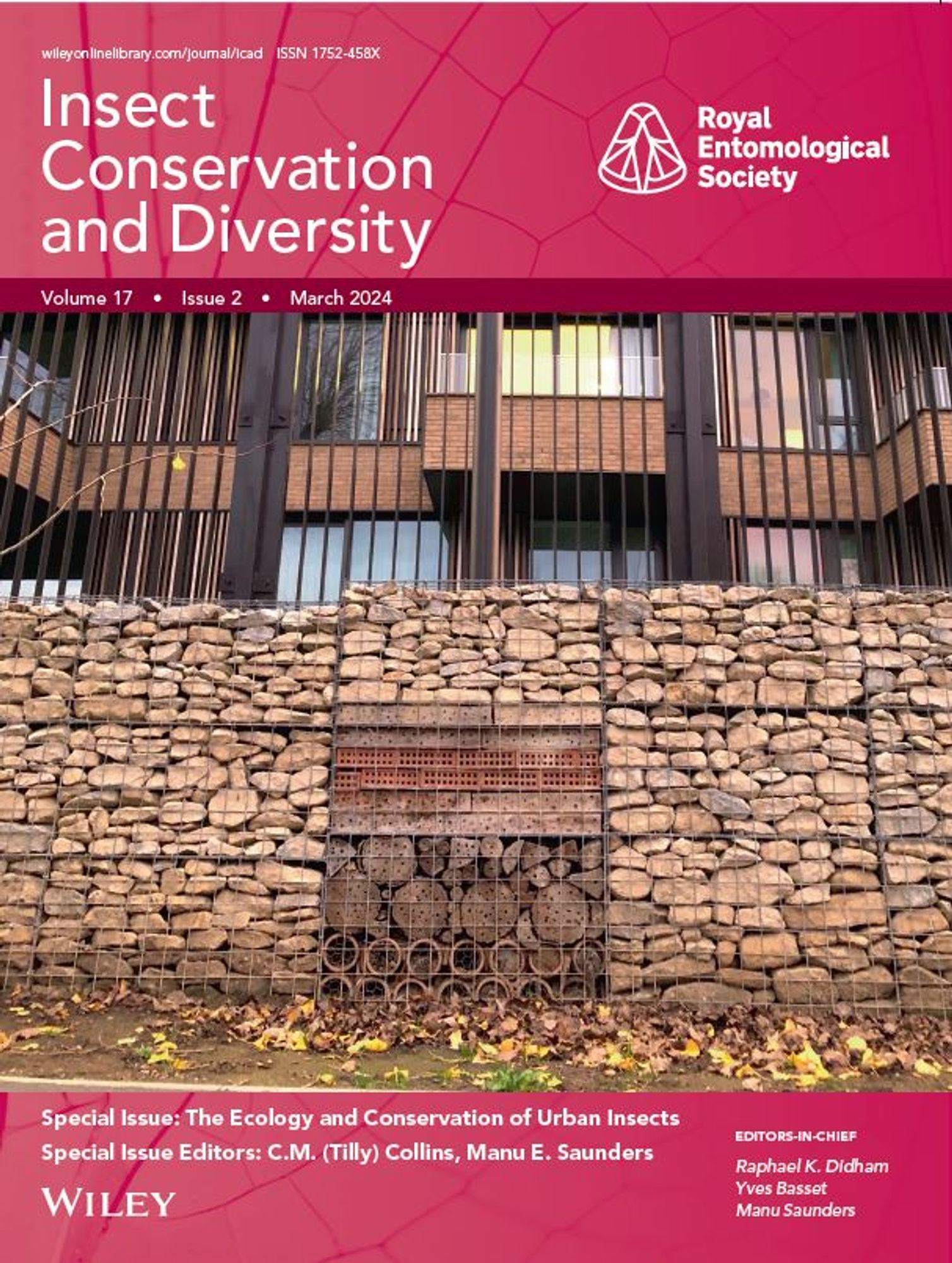 Journal issue cover for the Special Issue featuring a large insect hotel wall in front of a high-intensity urban apartment block.