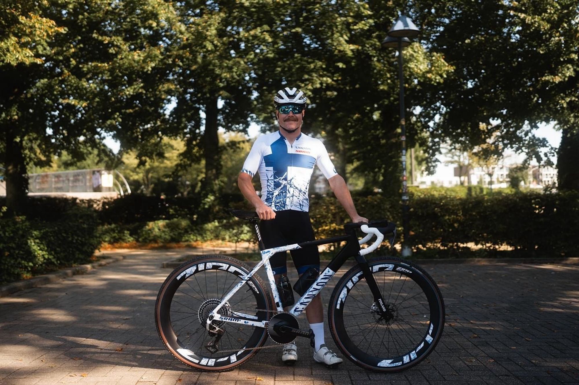 Valterri Bottas getting ready to ride gravel in his Finnish national kit.