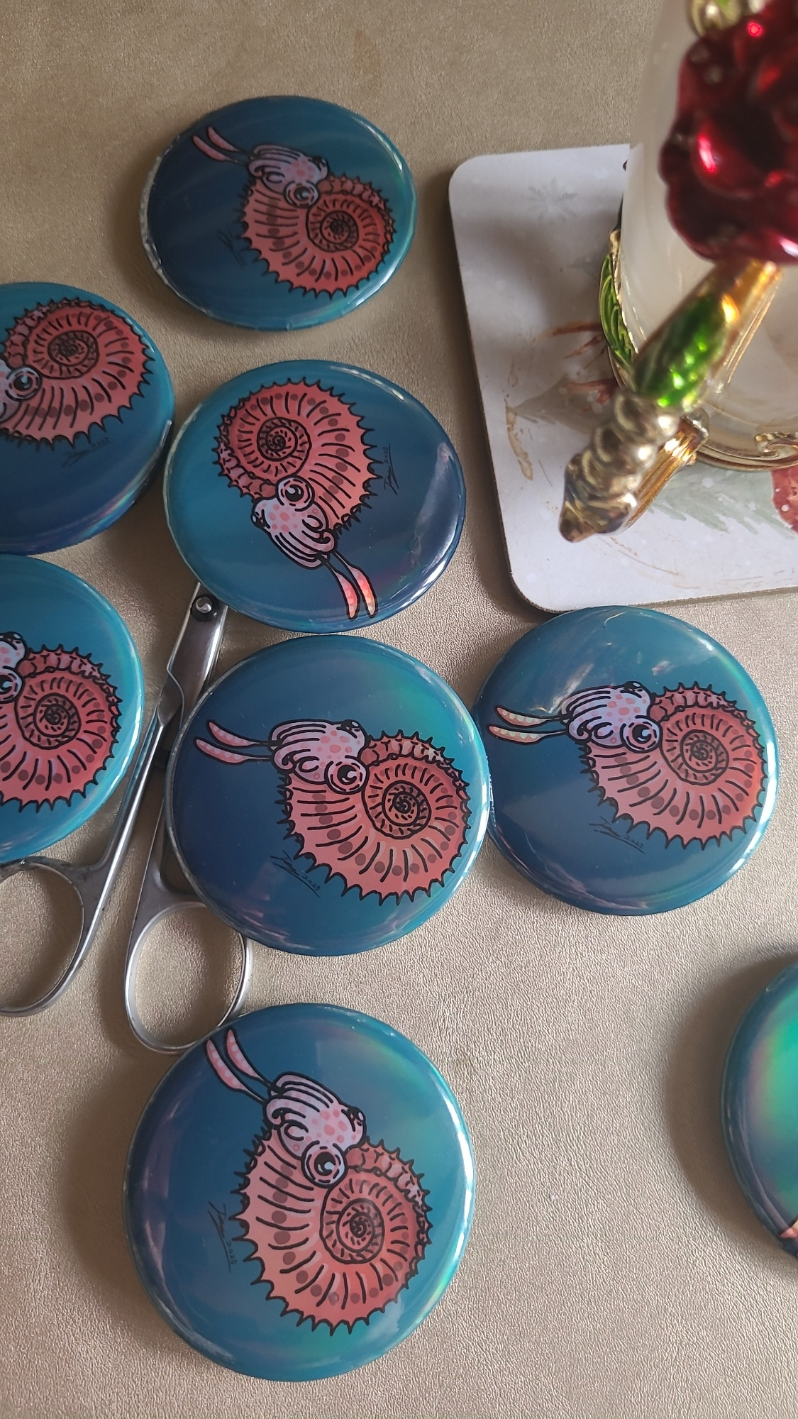 Close up of ammonite badges