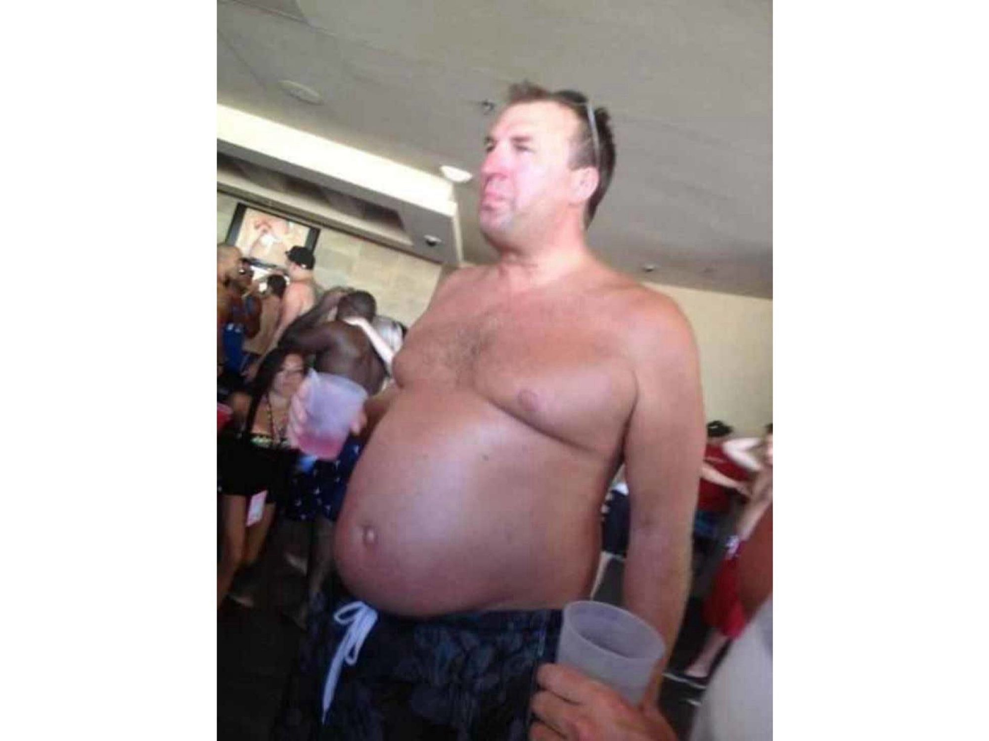 Illinois coach Bret Bielema tan buff and shirtless