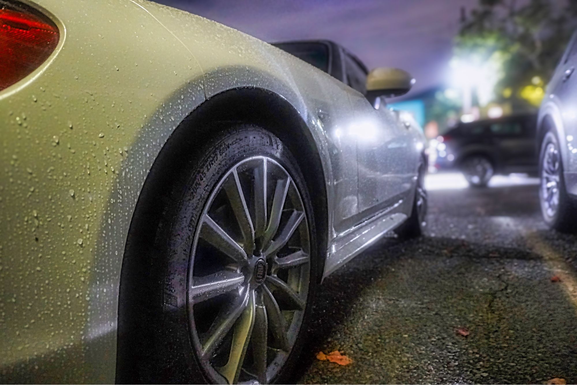 Fiat 124 Spider on a rainy evening.