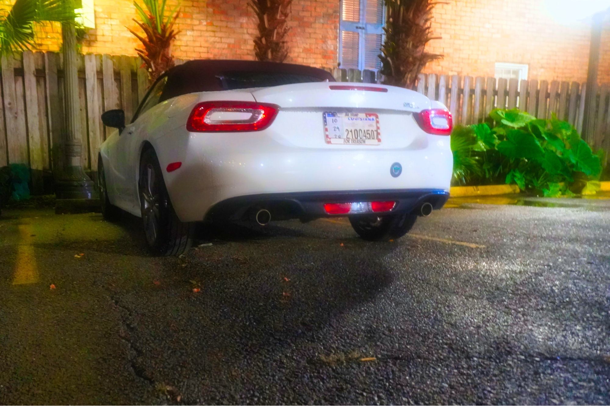 Fiat 124 Spider on a rainy evening.