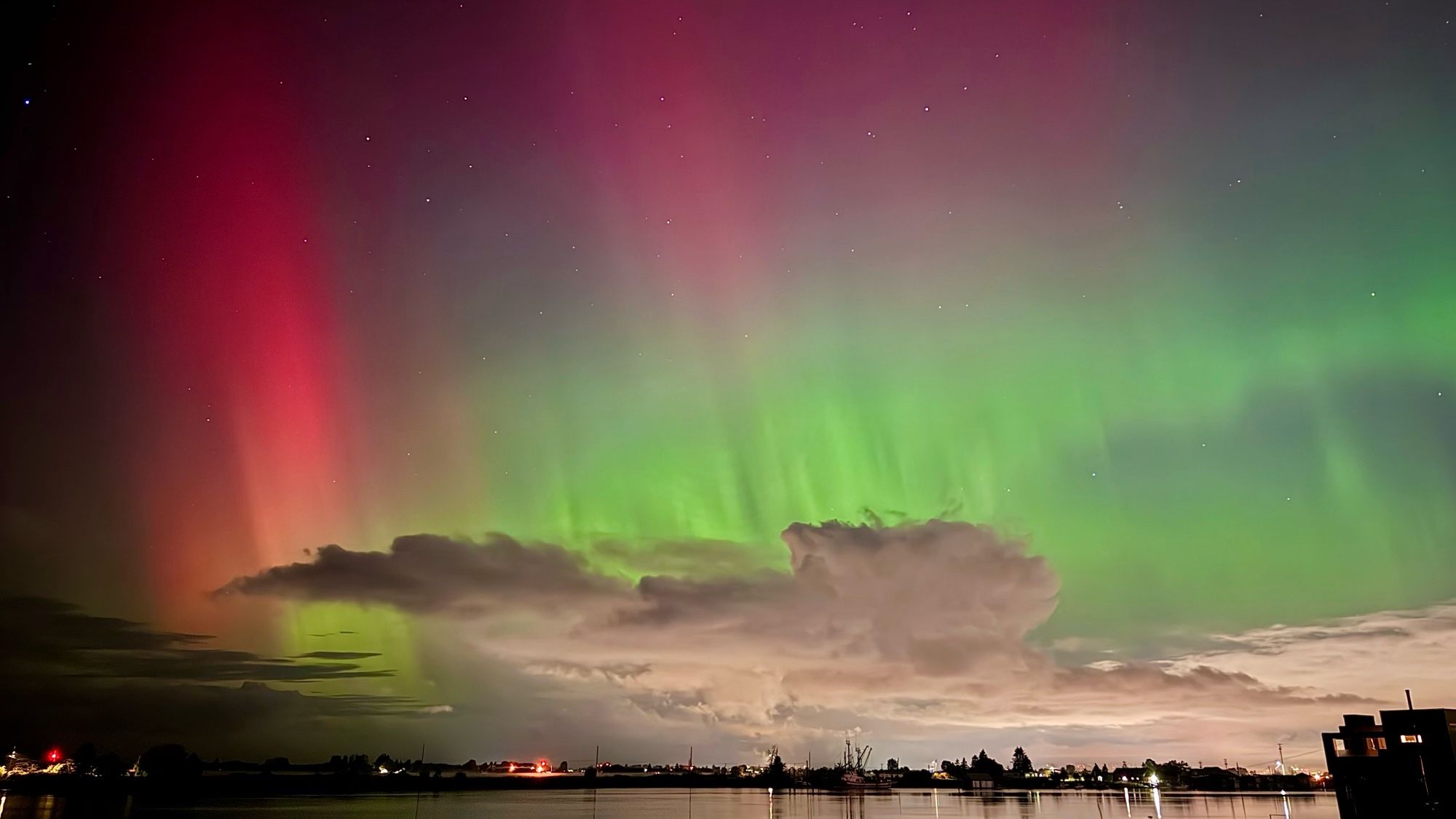 Picture of red & green Aurora Borealis late last night, early this morning in Vancouver BC over areas where the clouds broke up