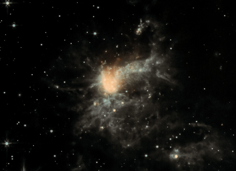 A mesmerizing infrared image of the irregular galaxy NGC 6822, captured by the Mid-Infrared Instrument (MIRI) aboard the James Webb Space Telescope. The image showcases a vibrant cosmic tapestry, revealing the galaxy's intricate structure and star formation regions. The colors represent different infrared wavelengths, highlighting the distribution of gas, dust, and young stars. The image also offers a glimpse into the complex processes that shape the evolution of galaxies.