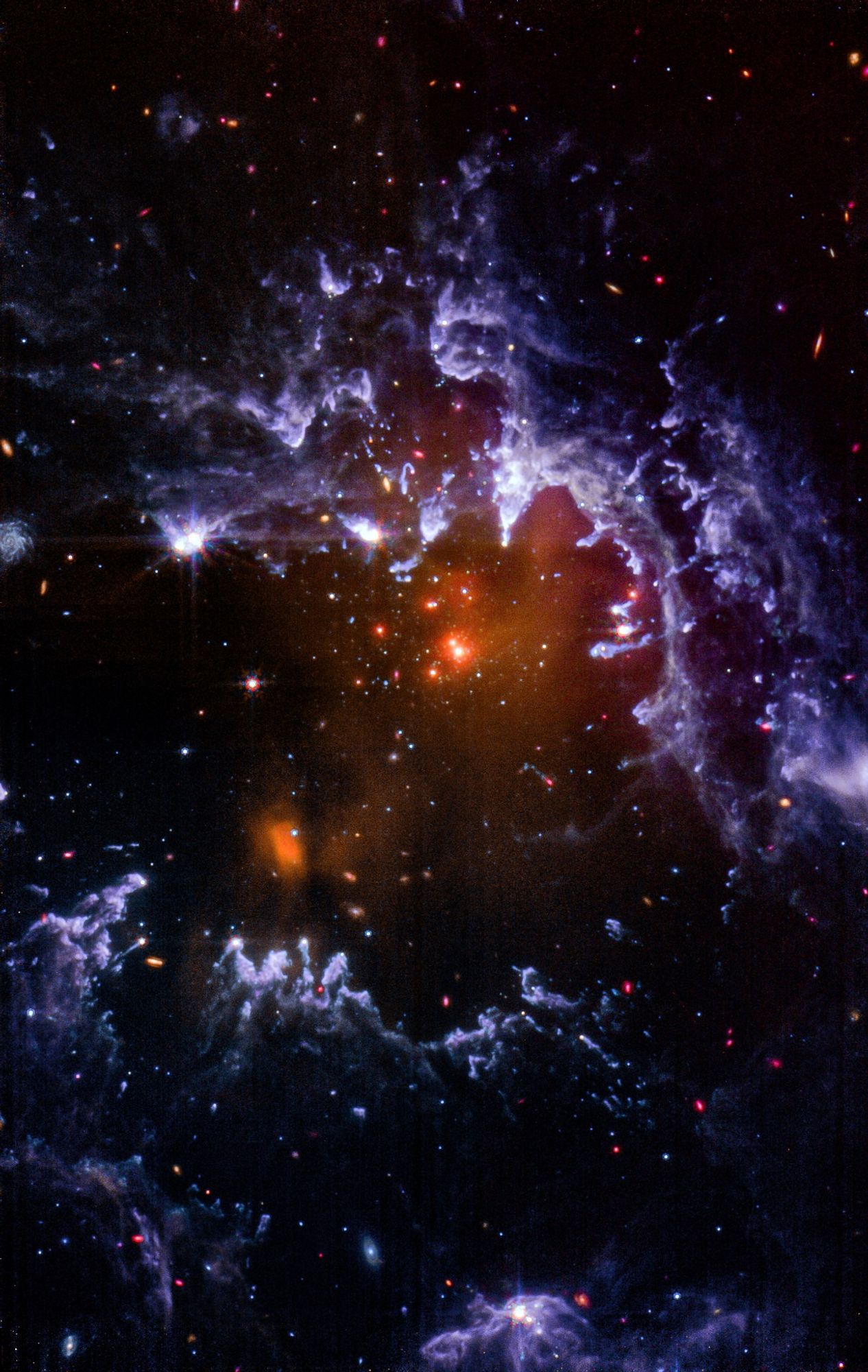 An ethereal tapestry of gas and dust in the Small Magellanic Cloud.

This mid-infrared image, captured by the James Webb Space Telescope's MIRI instrument, unveils the hidden depths of NGC 602. Unlike a visible-light image, MIRI allows us to pierce through the dust, revealing the cool gas and dust clouds where stars are born.

The image is dominated by wispy filaments and tendrils in various shades of blue and pink. These colors represent the different temperatures of the dust and gas. The cooler gas appears in hues of blue, while warmer regions glow pink.

Embedded within these filaments are likely pockets of denser gas, potential cradles for future stars. However, unlike a NIRCam image, the intense light from young stars is faint in this mid-infrared view.

Overall, this MIRI image offers a unique perspective on NGC 602, showcasing the vast, cool interstellar medium where star formation takes place.