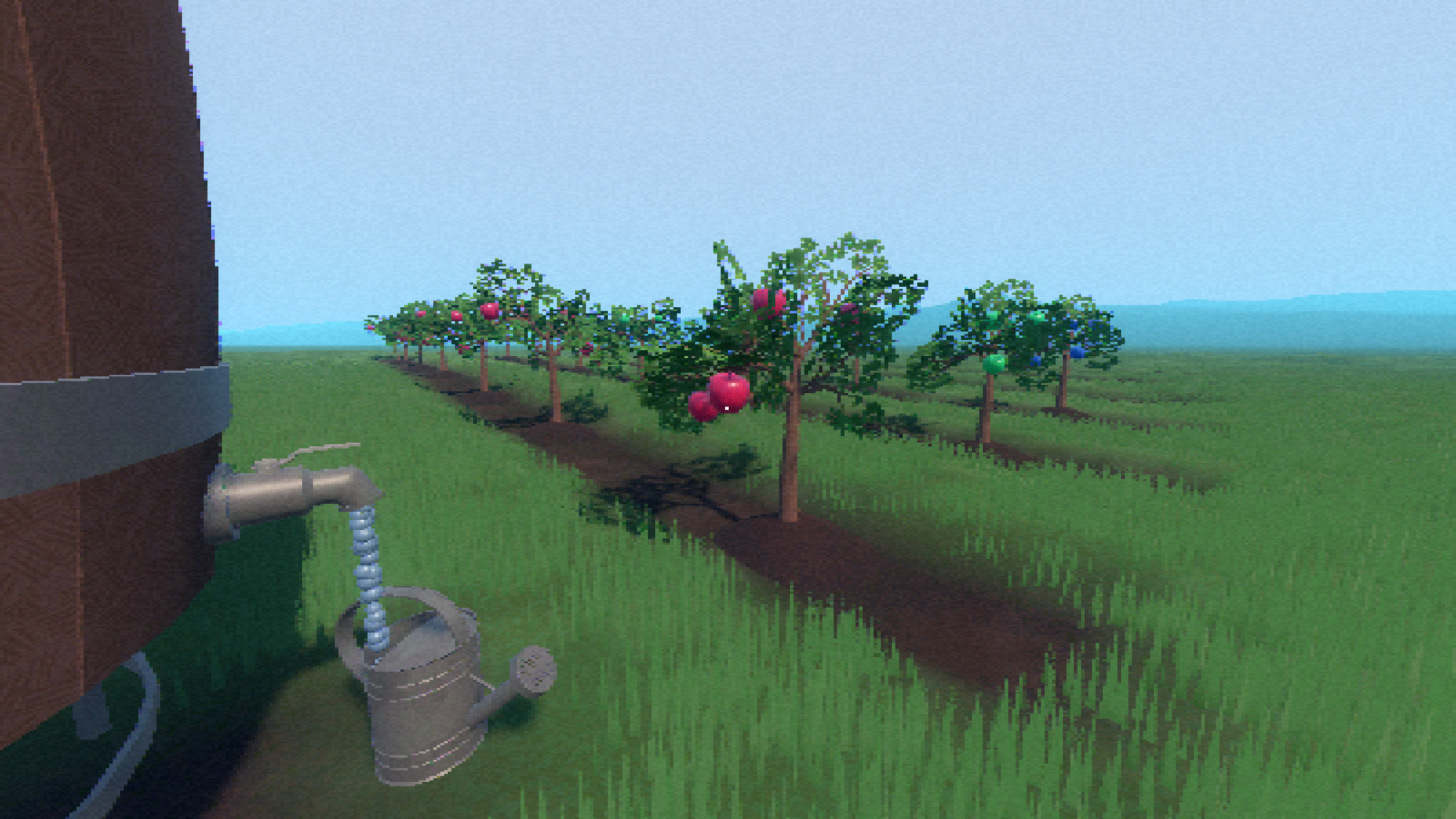 apple trees grow in big empty field while a watering can fills up with water