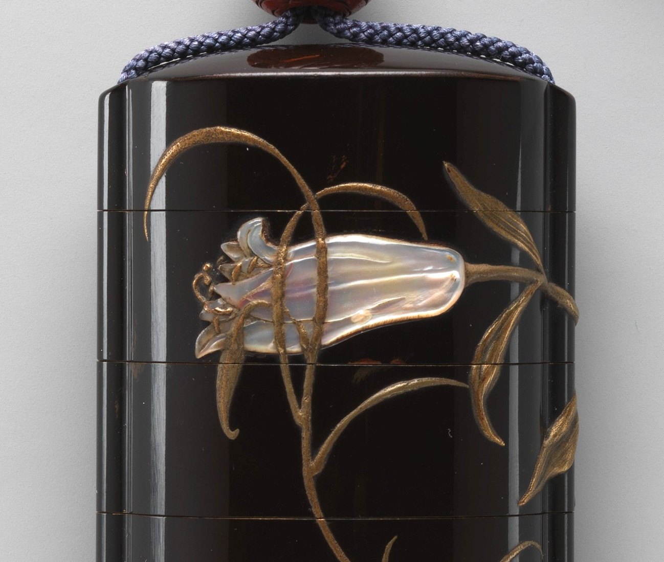Inrō with Design of Grasshopper on Stalk of Flowering Lily