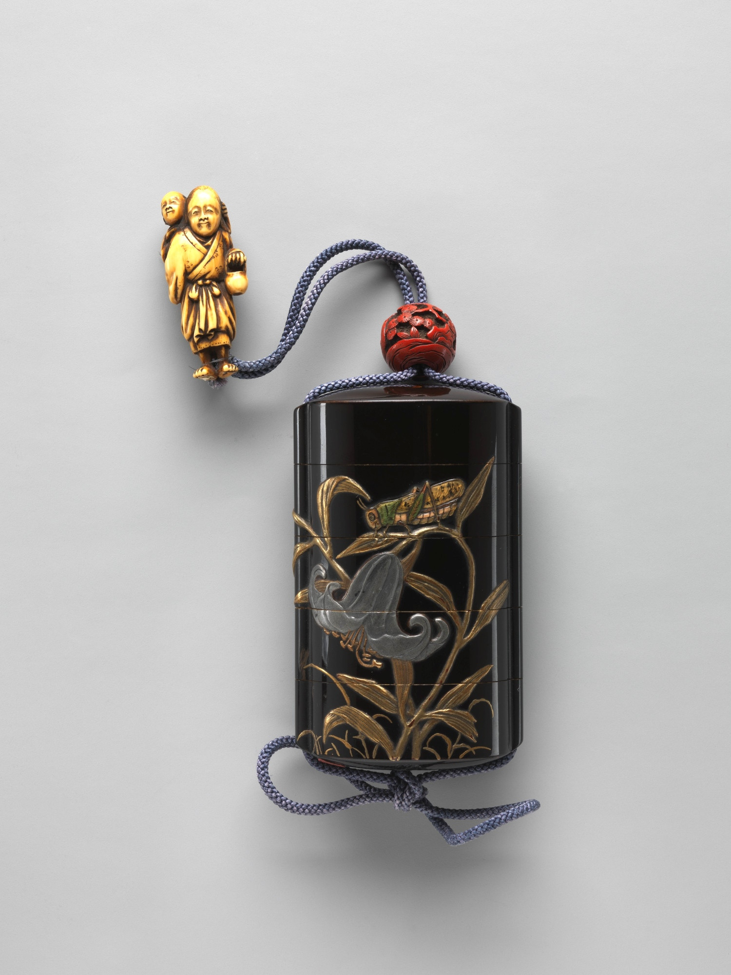 Inrō with Design of Grasshopper on Stalk of Flowering Lily