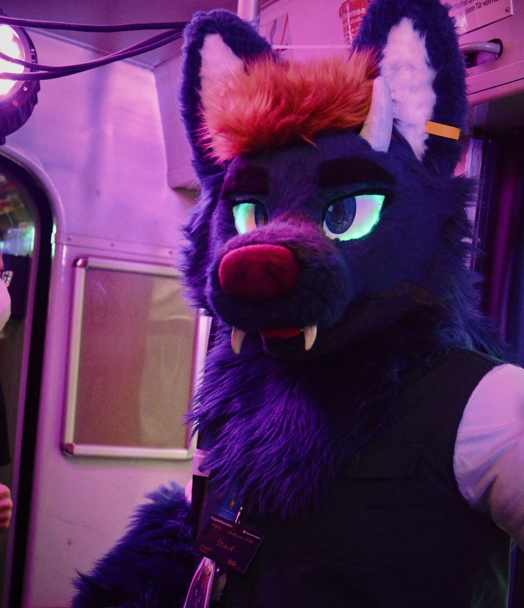 A picture of me in suit inside the party tram. Looks like I'm not doing anything, which is true. I was enjoying the cool outside air coming in through the open windows of the tram.