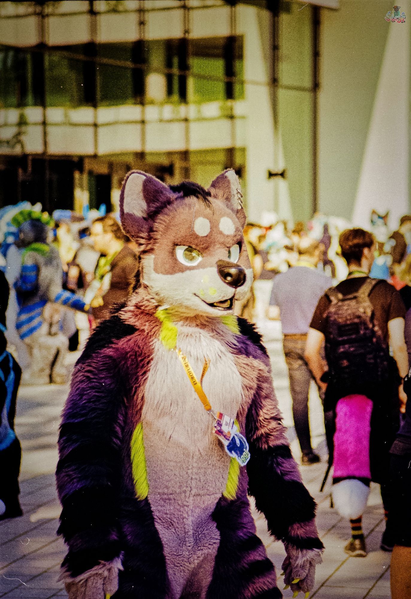 A suiter walking across CCH plaza.