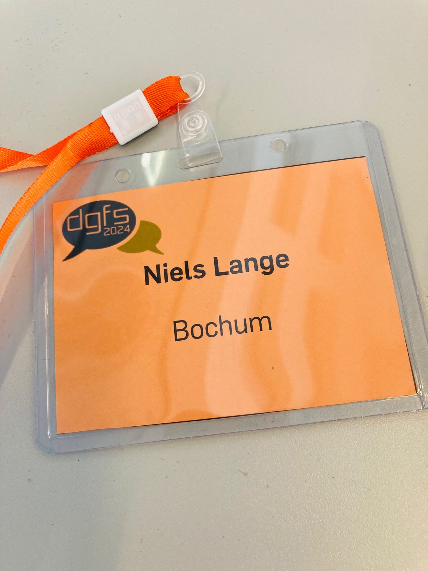 my name tag for the dgfs 2024 (a linguistics conference)