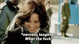 Animated gif from the HBO series Veep in which Julia Louis-Dreyfus, as President Selina Meyer, laughs nervously while saying “What the fuck?” through her smiling teeth