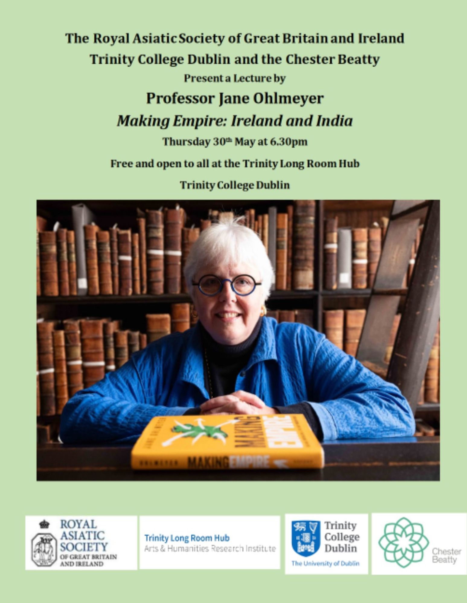 Photo of Jane Ohlmeyer with her book 'Making Empire'. Text: The Royal Asiatic Society of Great Britain and Ireland, Trinity College Dublin and the Chester Beatty Present a Lecture by Professor Jane Ohlmeyer: Making Empire: Ireland and India. Tuesday 20th May at 6:30 pm. Free and open to all at the Trinity Long Room Hub, Trinity College Dublin.