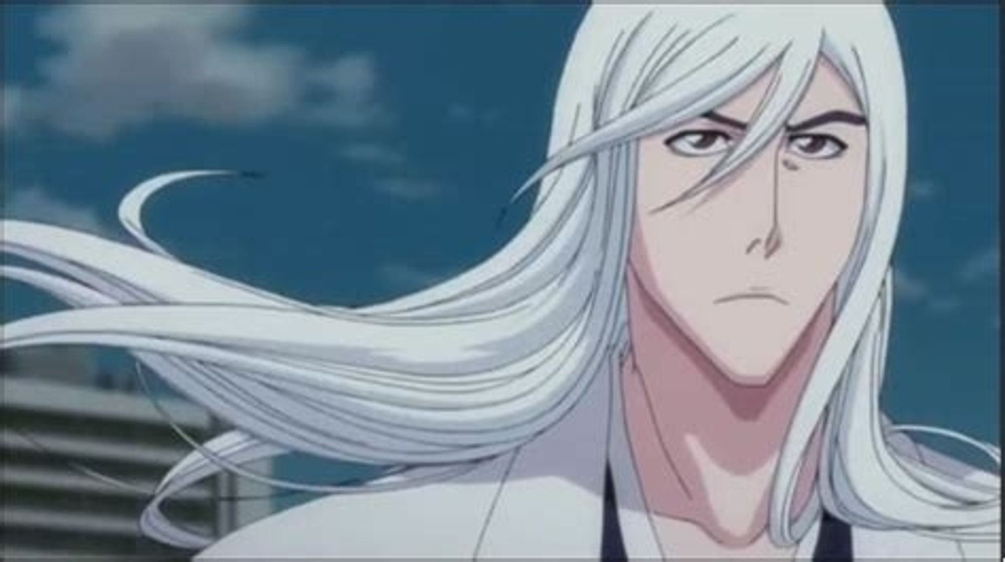 Jushiro Ukitake from Bleach, looking ahead with a determined look on his face as the wind blows his long, white hair