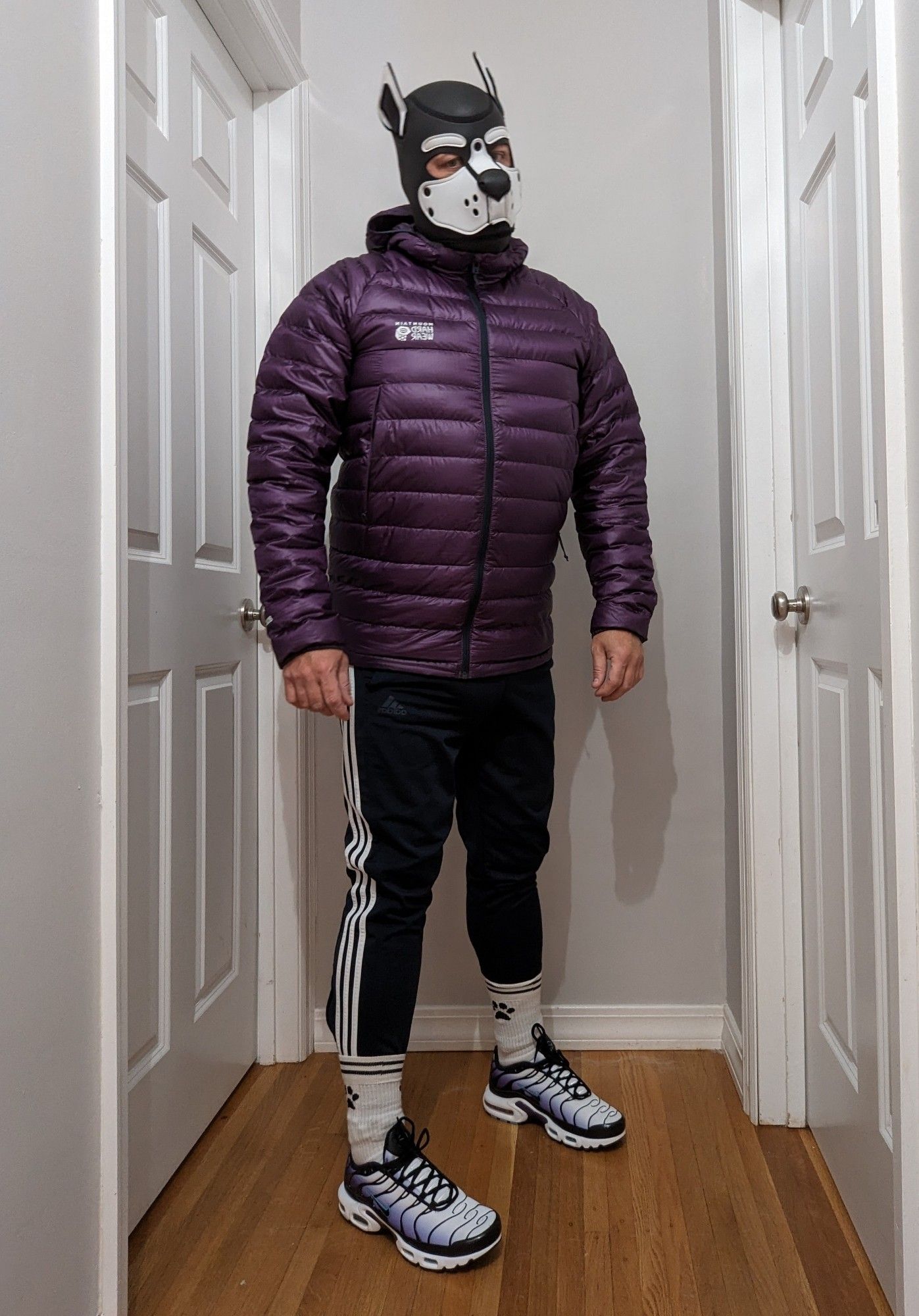 Me in a white pup hood, with purple down jacket, Adidas pants and purple & white Nike Tn's