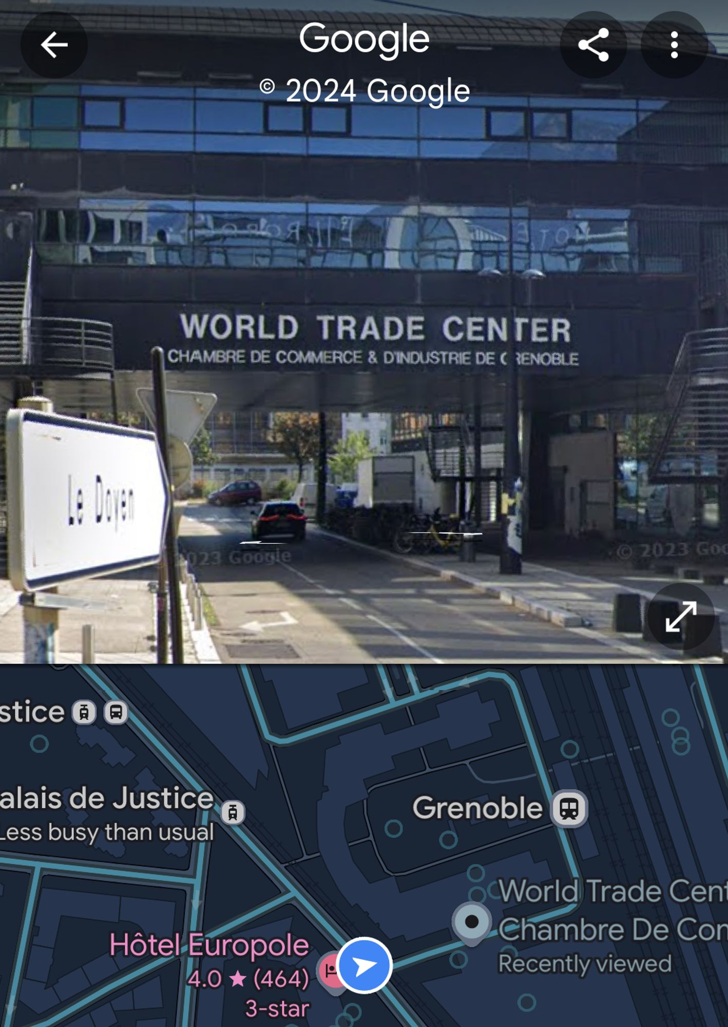 A screenshot from Street view showing a small building on Grenoble called the "World Trade Center"