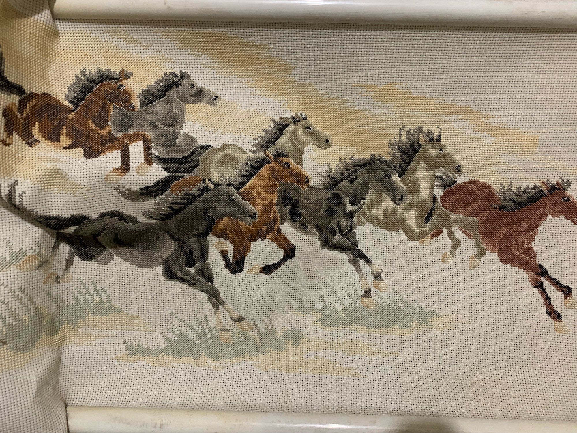 Cross stitch of 7 8 horses