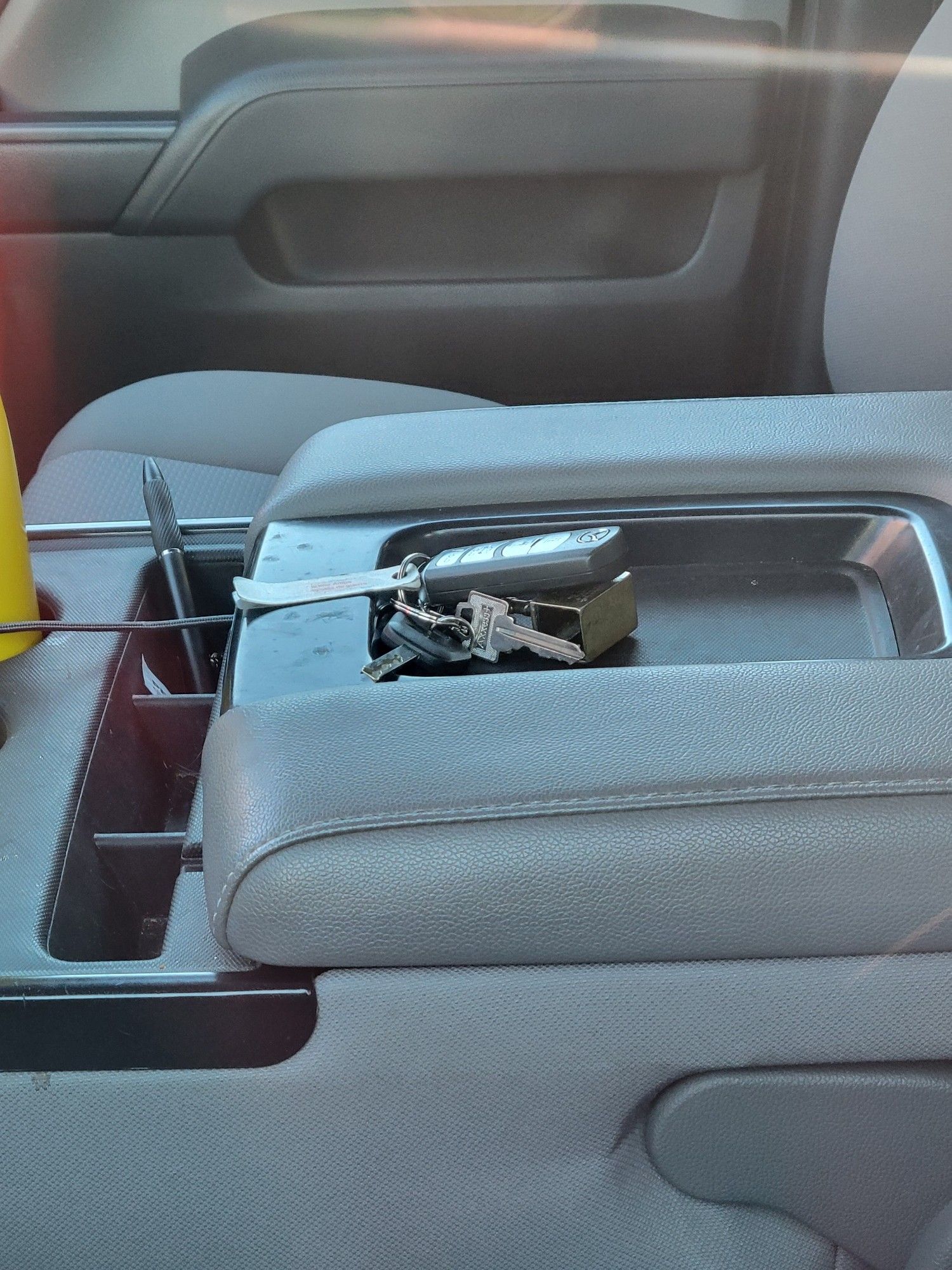 My keys sitting in the center console of my lock pickup truck