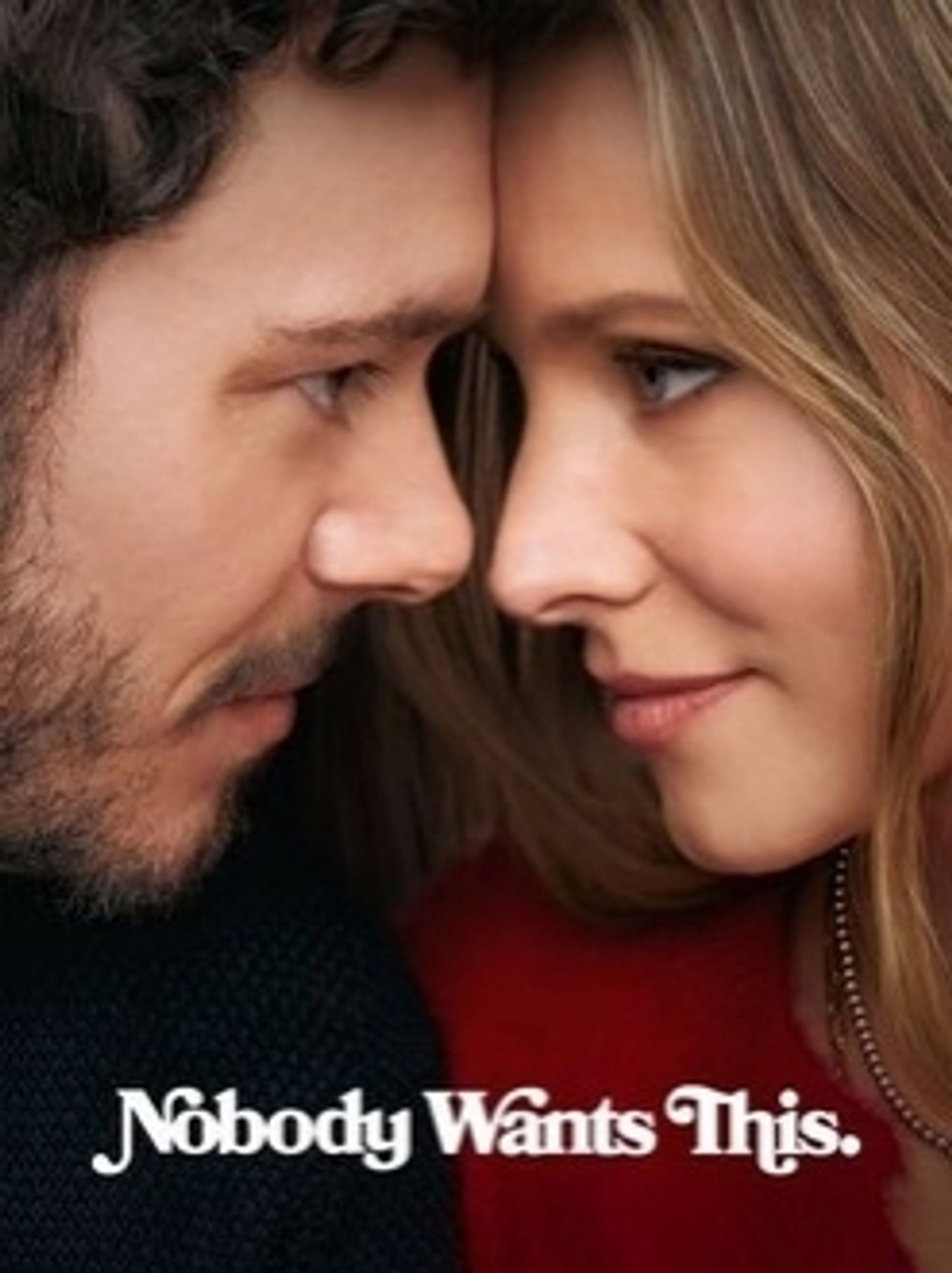 TV show poster with Adam Brody and Kristen Bell are touching foreheads and staring into each other's eyes, in a closeup of their faces. Text says, Nobody Wants This.