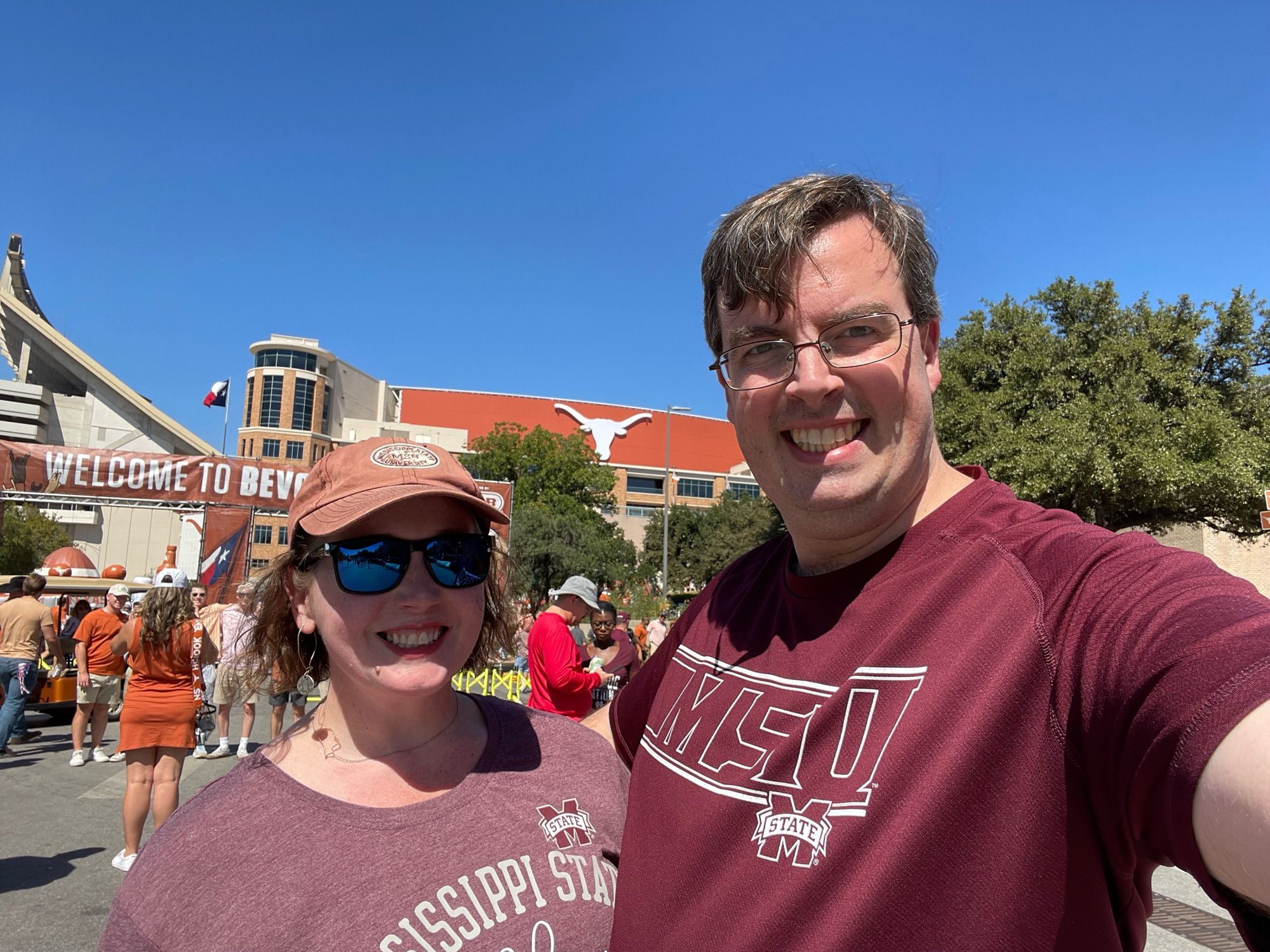 Me and my wife wearing Mississippi State maroon and white outside the University of Texas football stadium