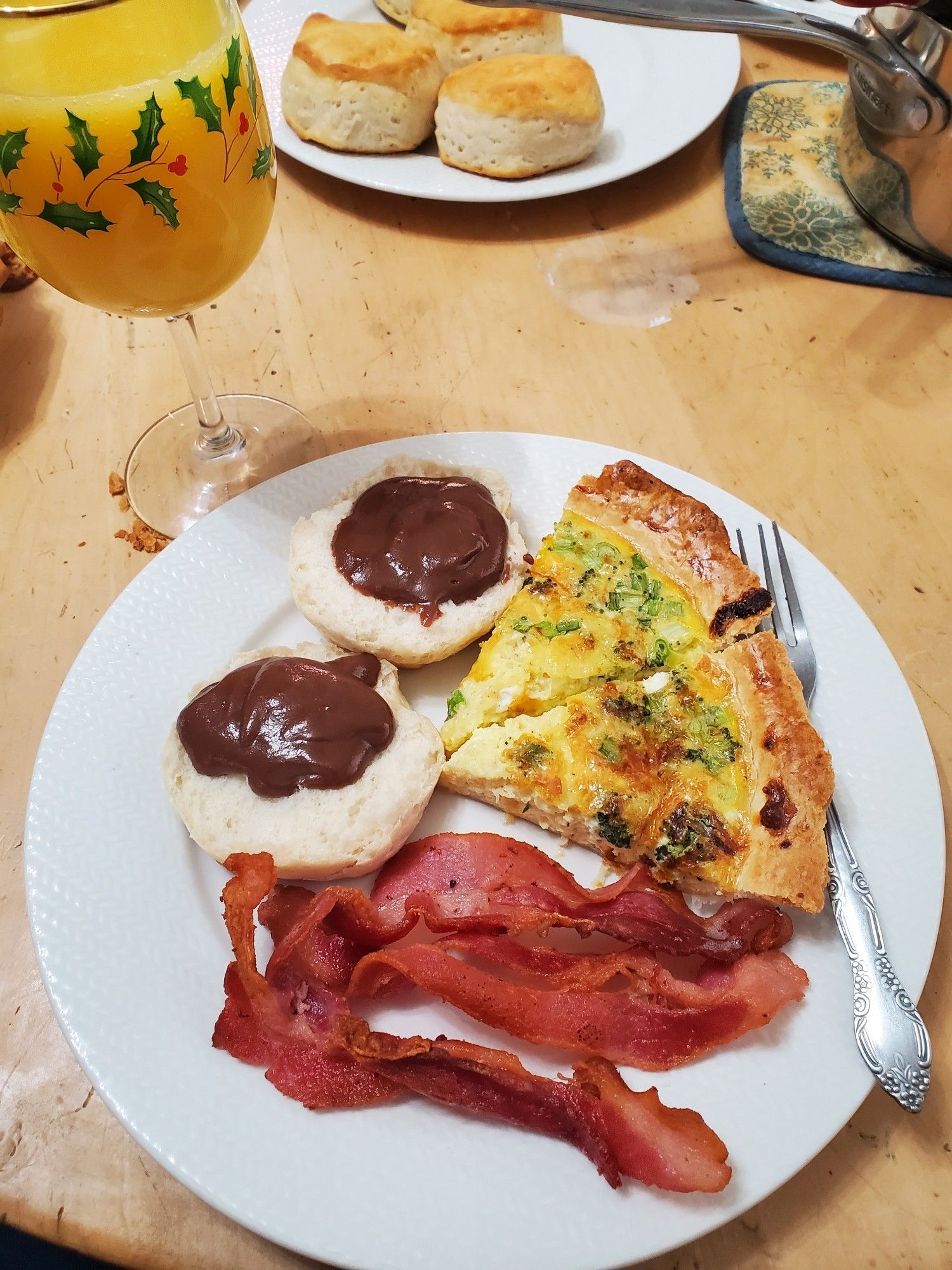 Quiche with bacon and biscuits with chocolate gravy.