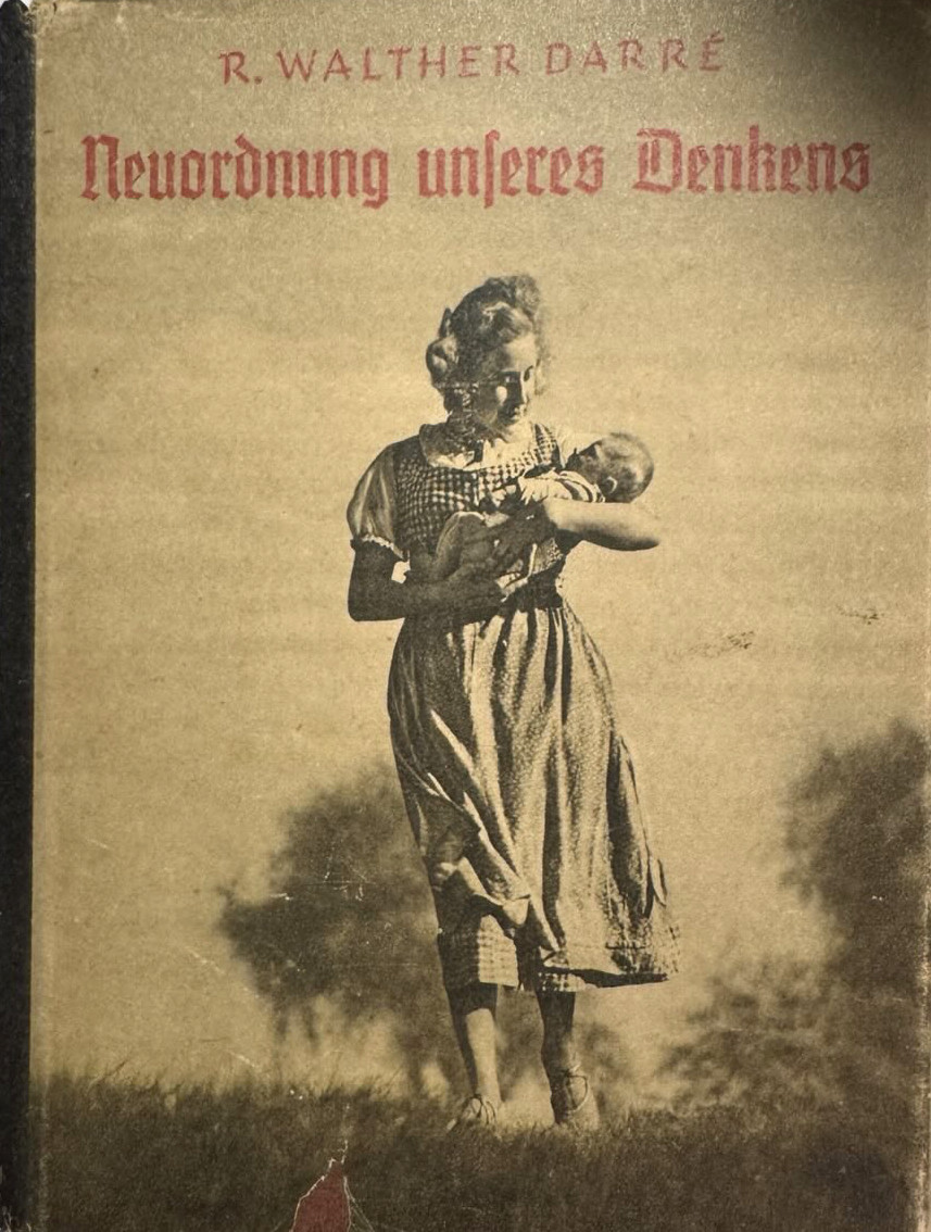 Woman on field with baby, caption in source reads "Dust jacket of R. Walther Darré's Neuordnung unseres Denkens (New Order of Our
Thought, Goslar [1940]), halftone, 20.9 x 15.4 cm, photograph by Heinrich Heidersberger