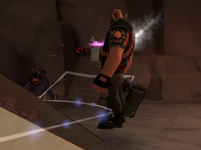 An enemy Spy in the process of disguising as the Heavy he stabbed moments before capturing this, the disguised Spy is in the infamous "A-Pose" because it was taken at the first exact frame the disguise activated