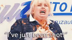 chili to the chest "i've just been shot" pitch perfect gif 