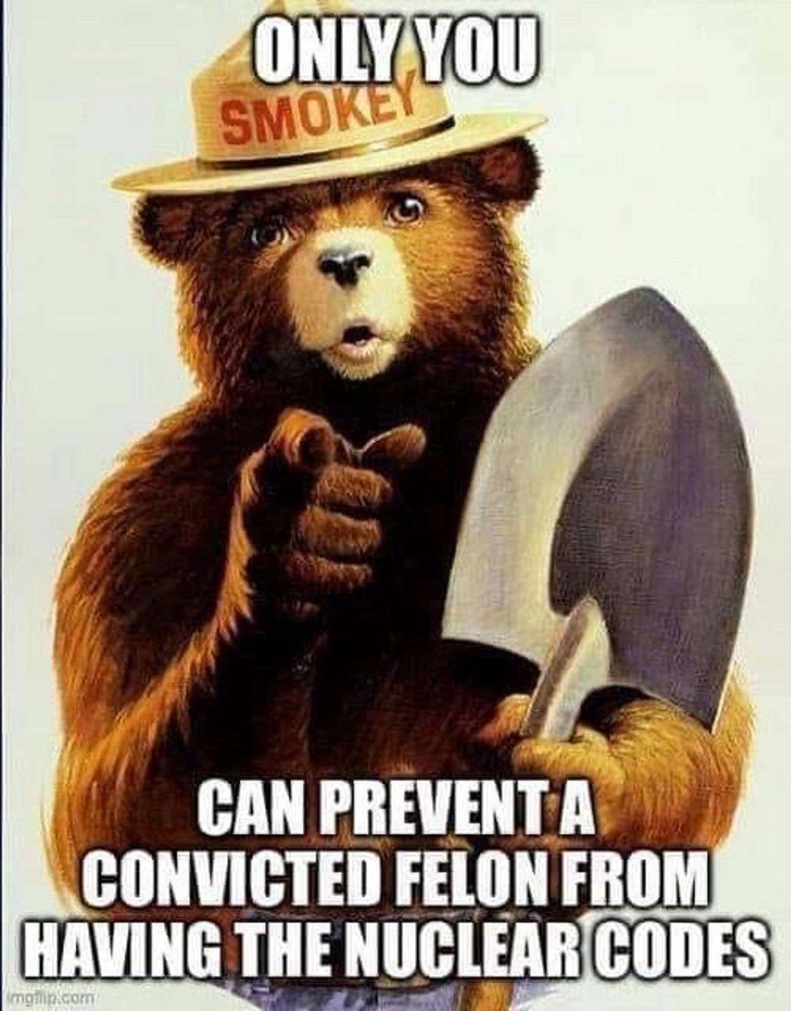 A classic color drawing of Smokey Bear wearing a park ranger hat and holding a shovel in his left paw with the following words superimposed: “Only you can prevent a convicted felon from having the nuclear codes.”