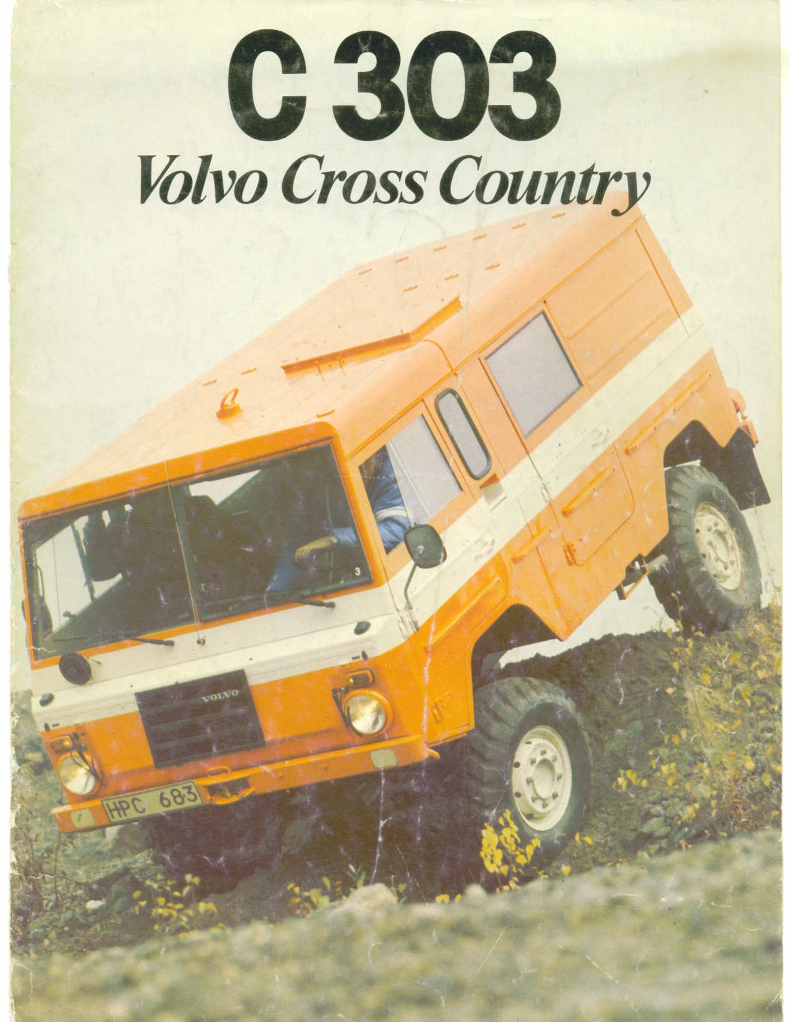 volvo c303 brochure cover with a yellow one coming over a berm