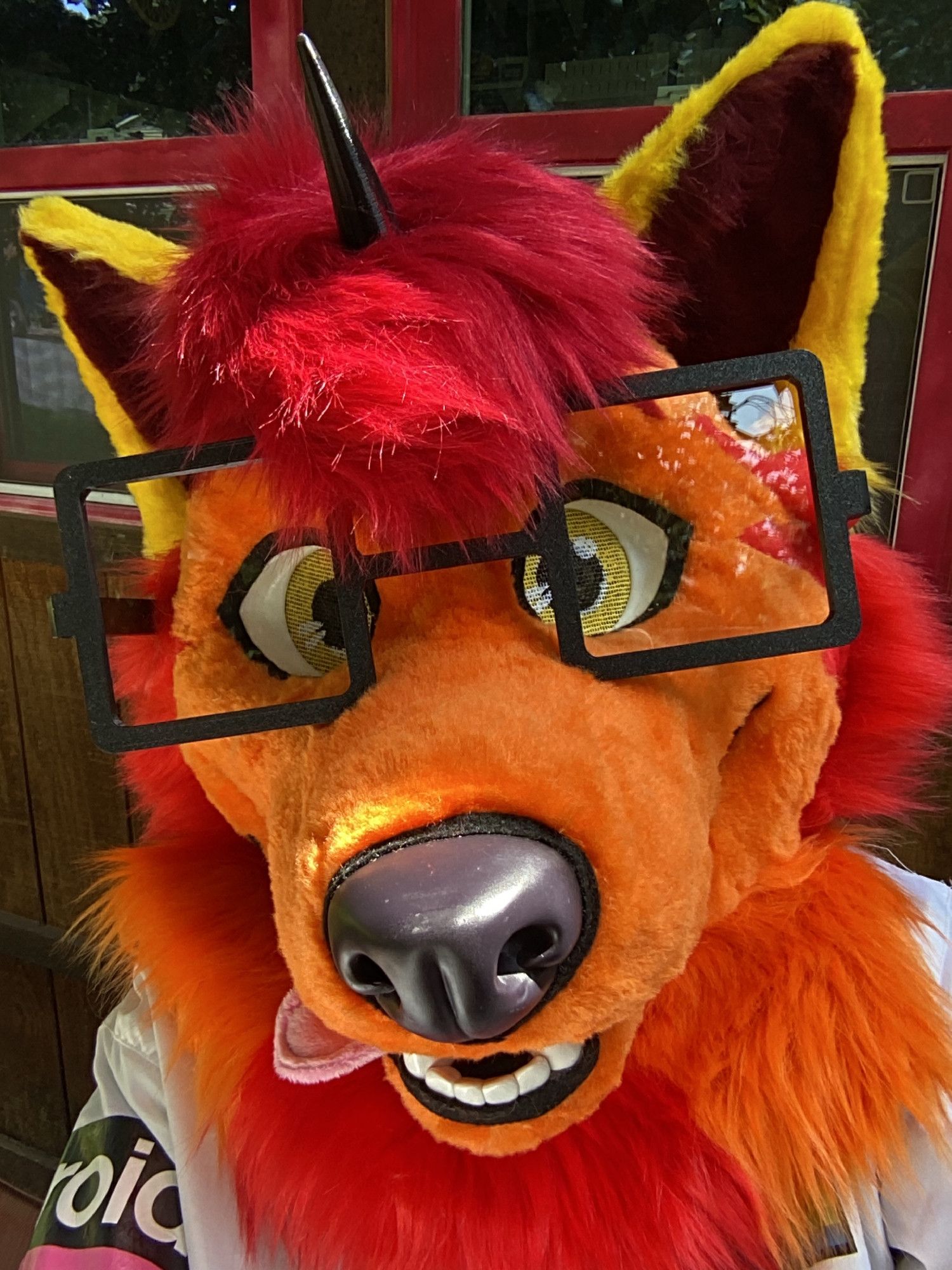 Fursuiter facing the front, with no magnetic eyelids.