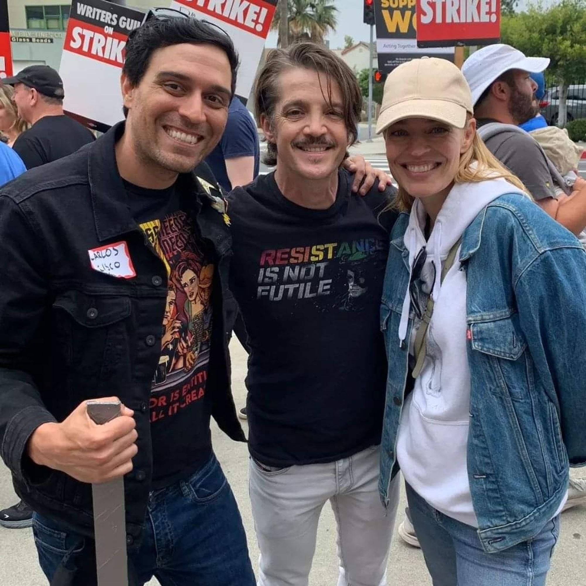 Carlos Cisco on the WGA picket line with Jonathan Del Arco and Jeri Ryan. 