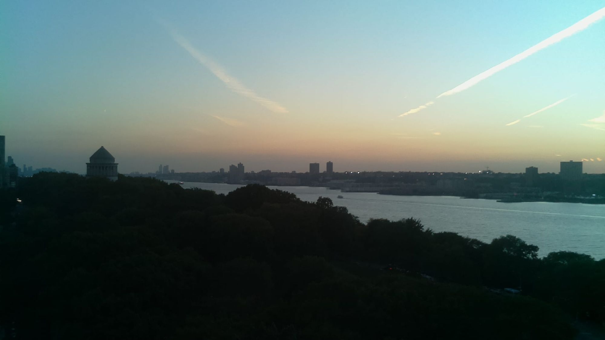 A photo of the Hudson river, at about (40.81, -73.96), taken at 10/3/2024, 6:34:38 PM.