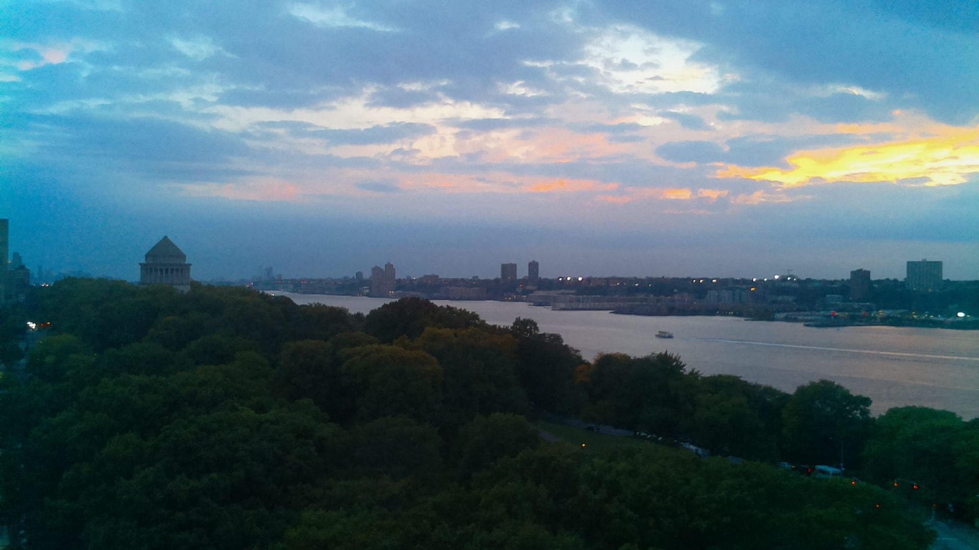 A photo of the Hudson river, at about (40.81, -73.96), taken at 10/4/2024, 6:34:43 PM.