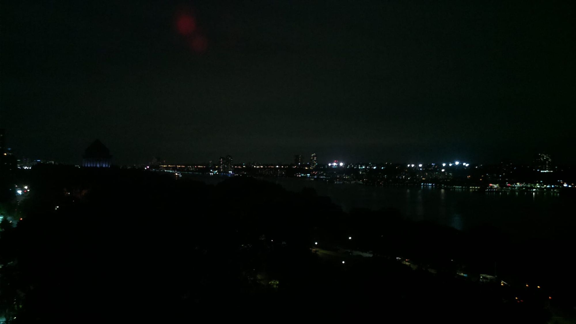 A photo of the Hudson river, at about (40.81, -73.96), taken at 10/4/2024, 9:42:42 PM.