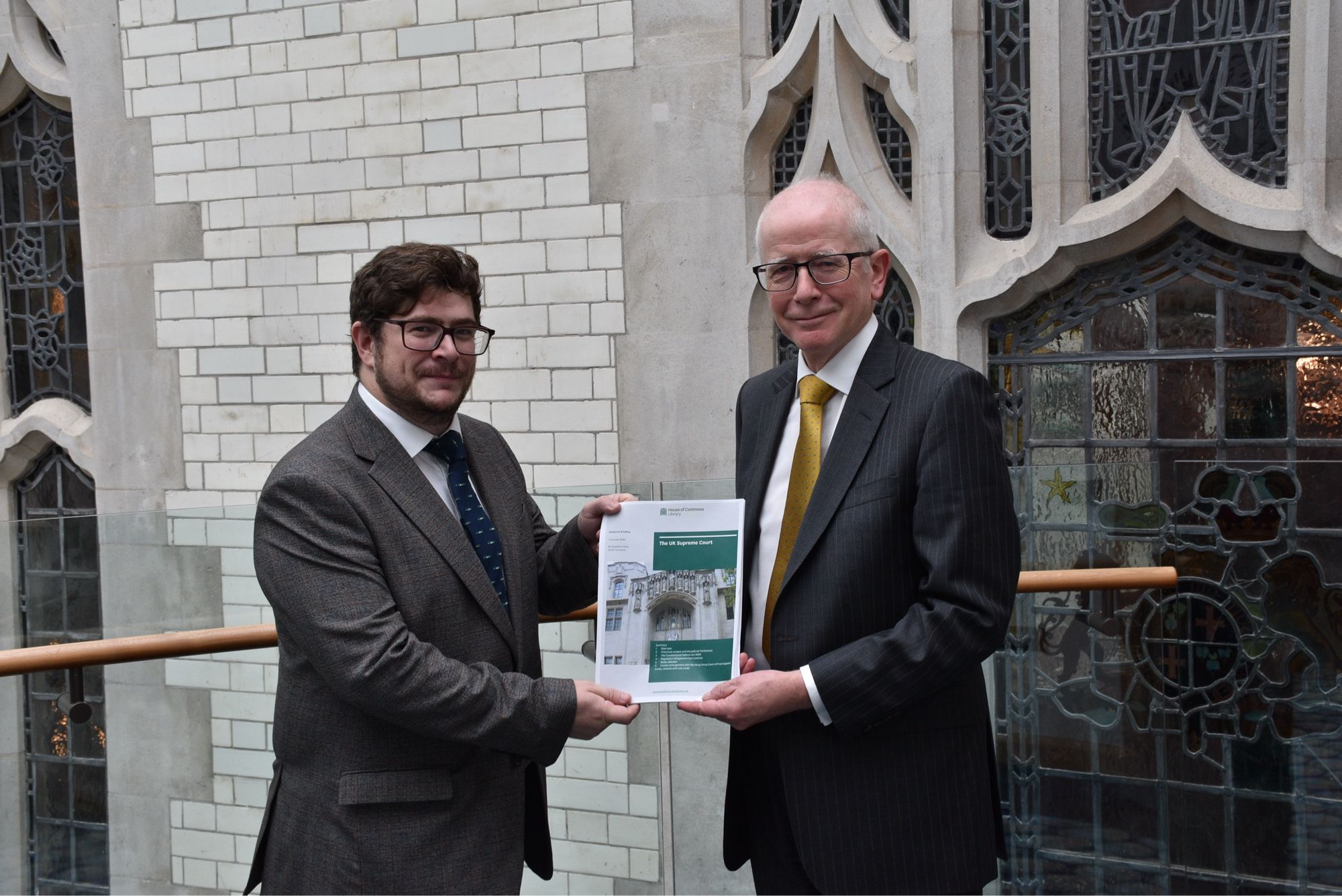 Graeme Cowie from the House of Commons presents Lord Reed, President of the UK Supreme Court, with the House of Commons Library’s new briefing paper on the UK Supreme Court.