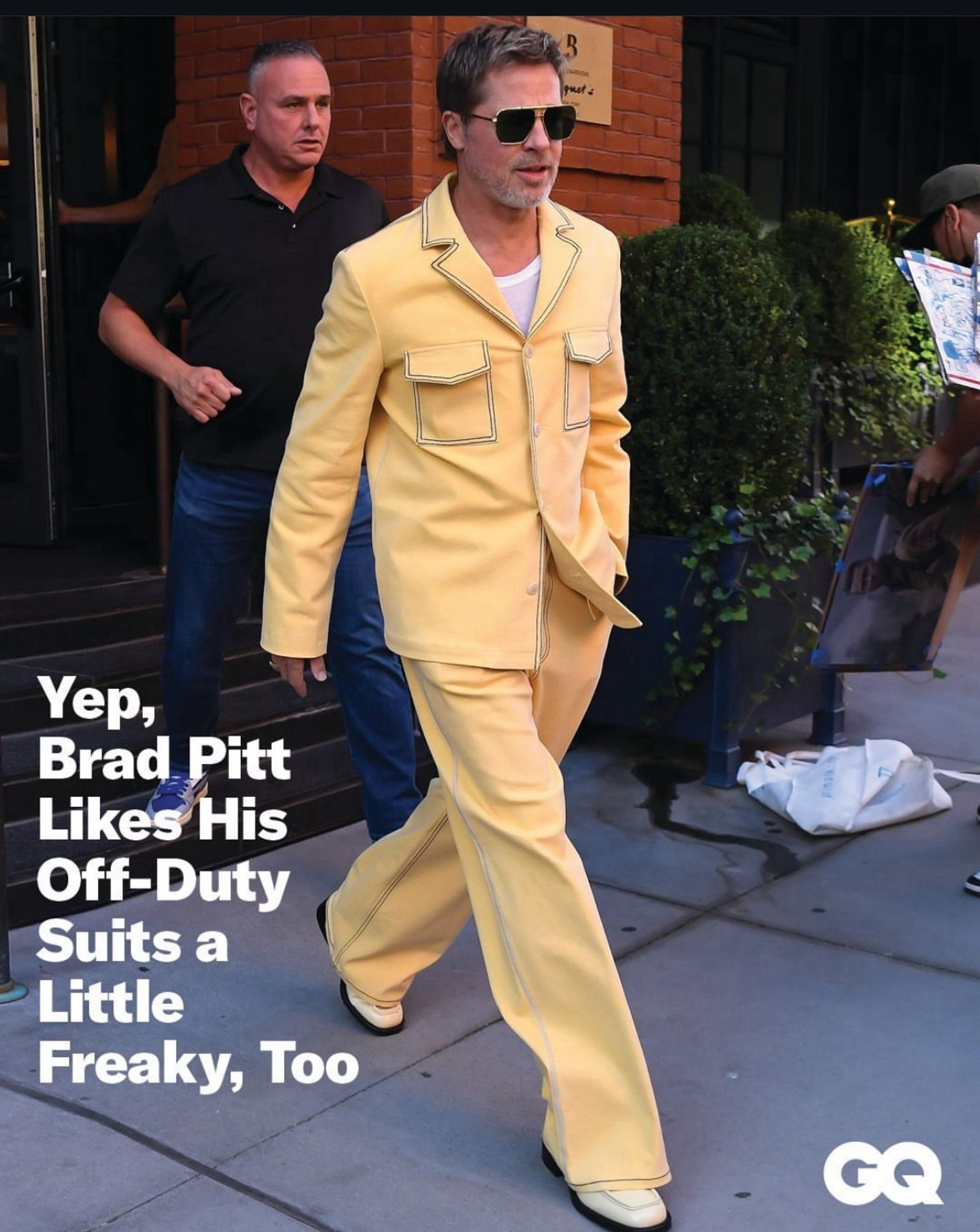 Brad Pitt in an exquisite butter yellow leisure suit & white shoes.